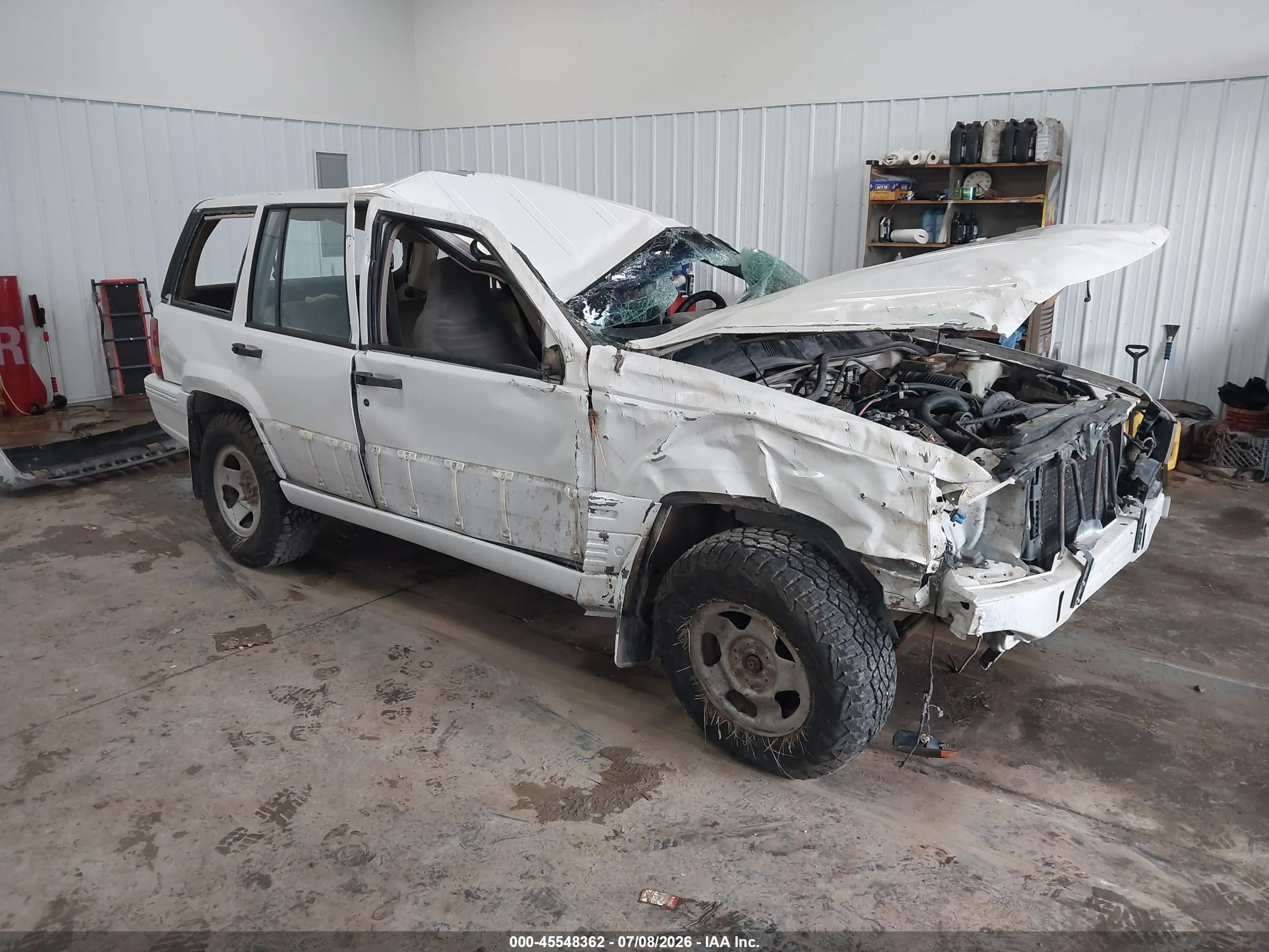 1993 Jeep Grand Cherokee Laredo, VIN 1J4GZ58S9PC513693 — Rollover