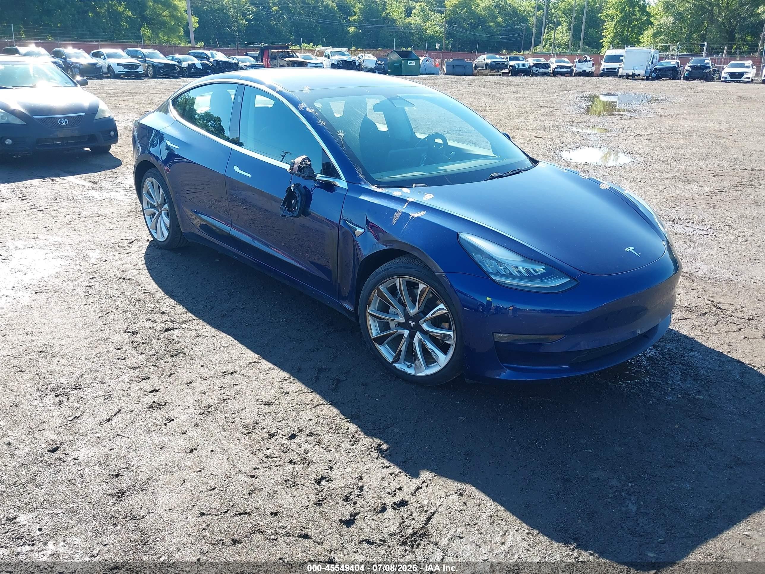 2018 Tesla Model 3 Long Range Battery, VIN 5YJ3E1EB8JF121814 — Side