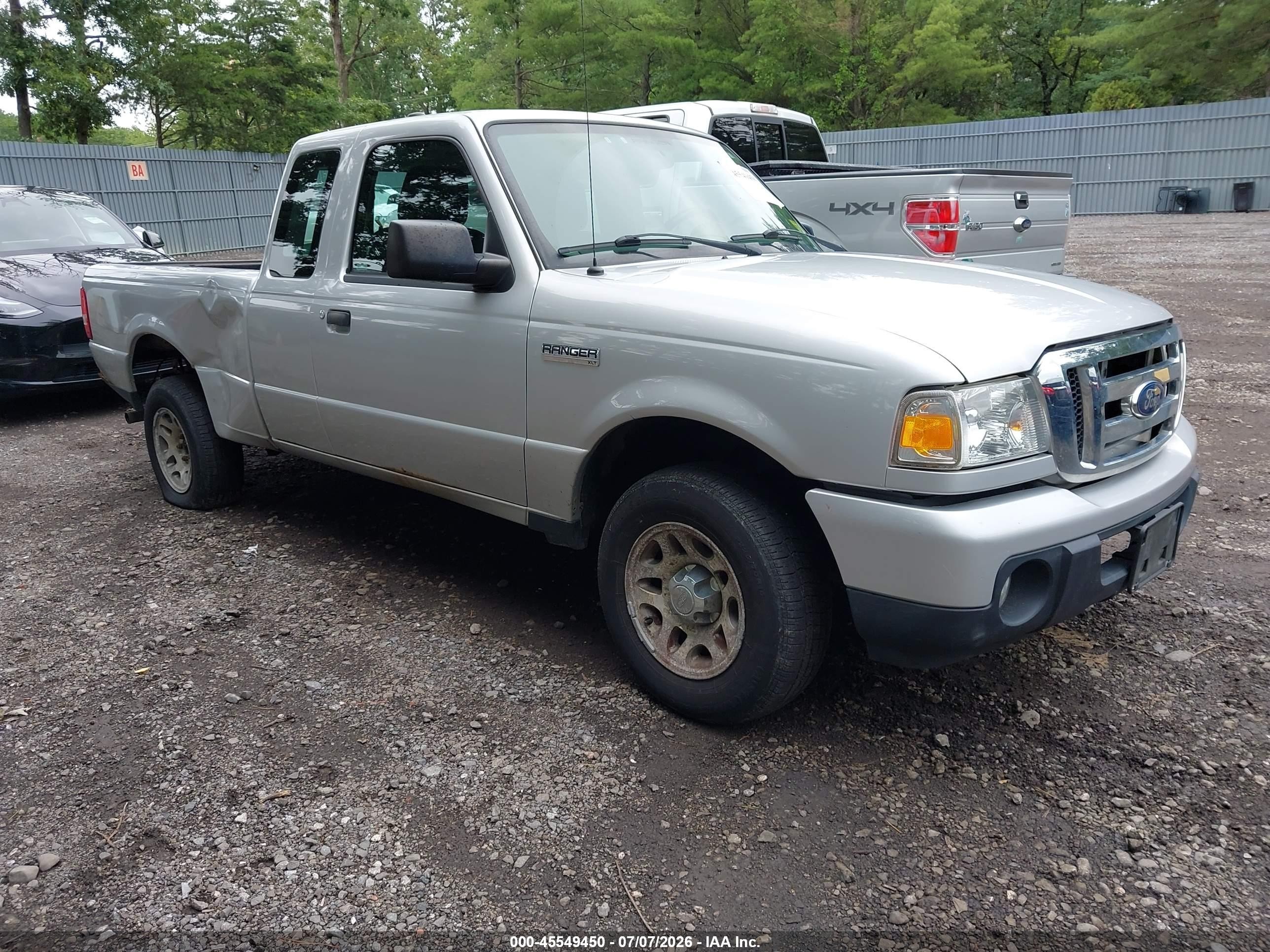 2011 Ford Ranger XLT, VIN 1FTKR4EE1BPA90750 — Side