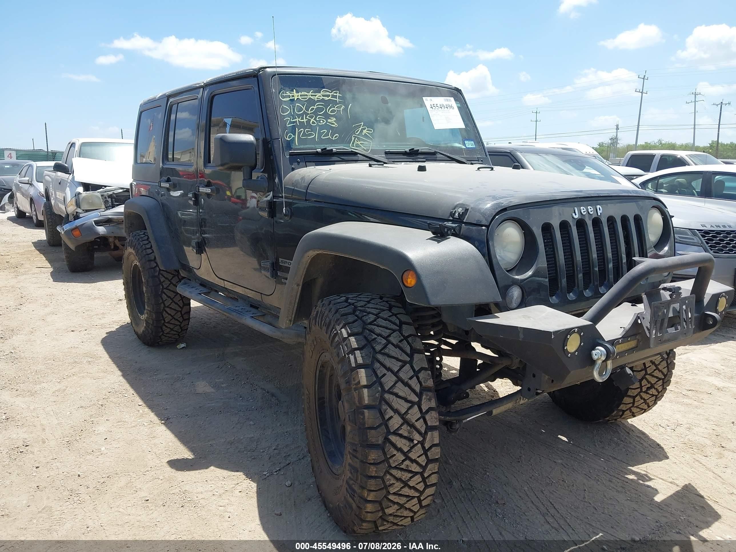 2014 Jeep Wrangler Unlimited Sport, VIN 1C4BJWDG2EL244853 — Rear end