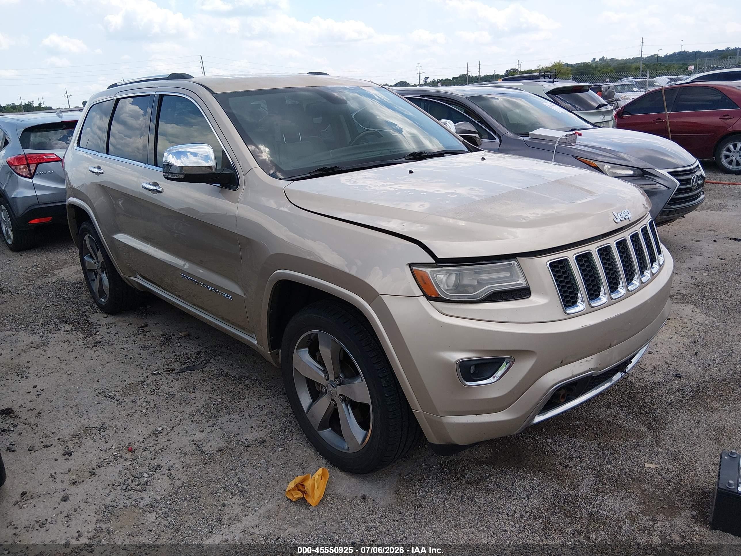 2014 Jeep Grand Cherokee Overland, VIN 1C4RJFCT5EC148292 — Hail
