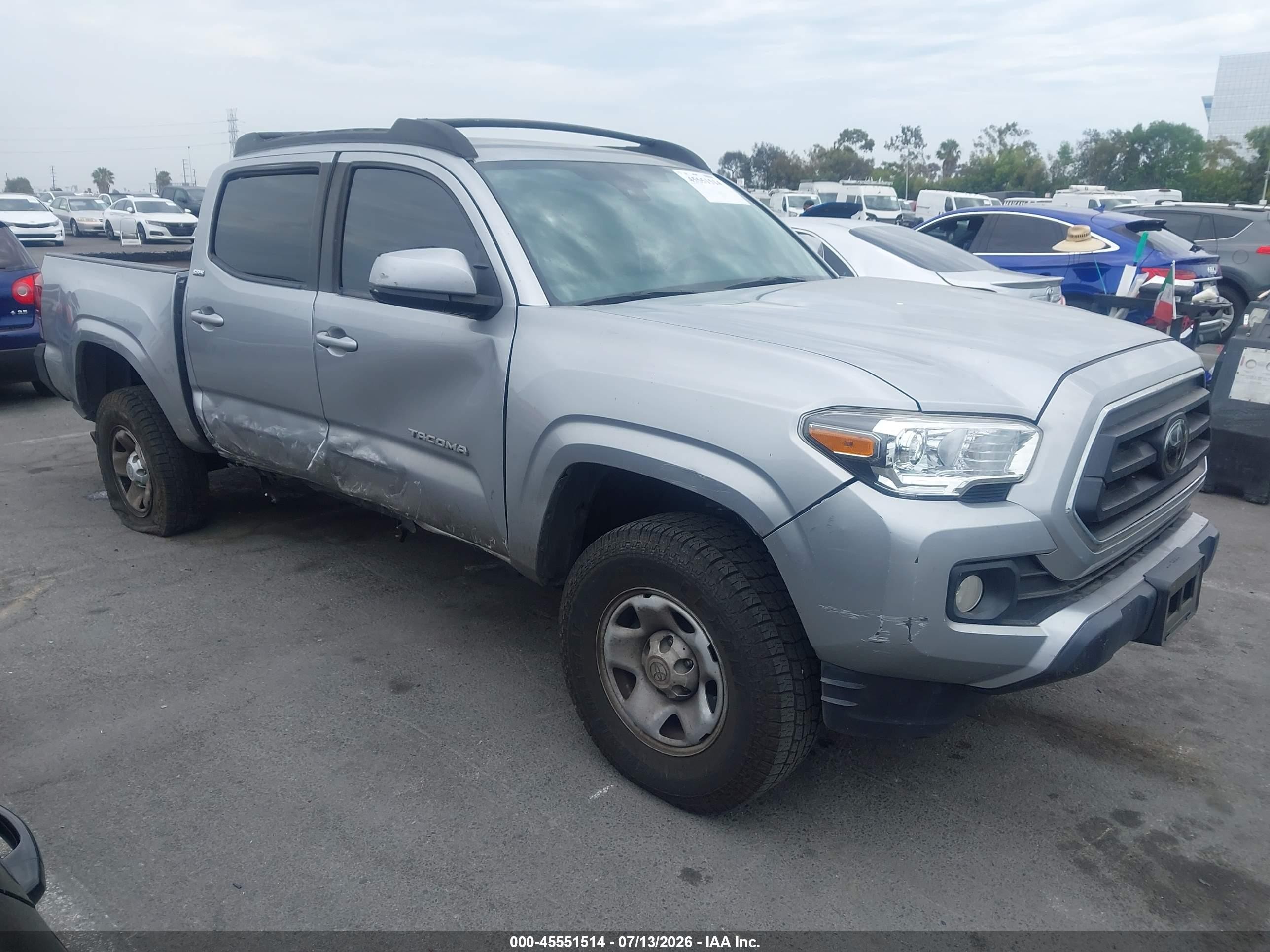 2021 Toyota Tacoma SR, VIN 5TFAX5GN8MX189055 — Side