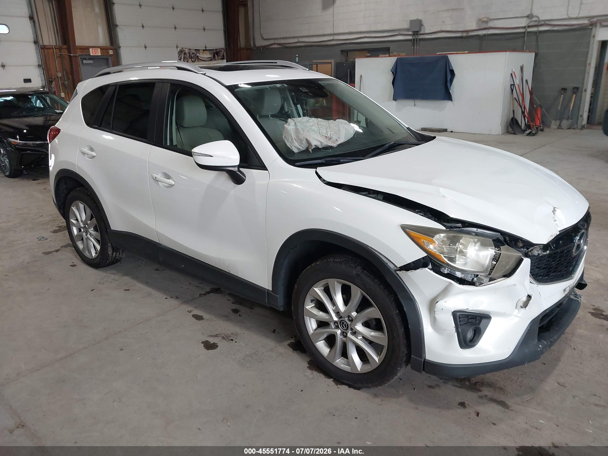 2015 Mazda CX-5 Grand Touring, VIN JM3KE4DY4F0502334 — По всему кузову