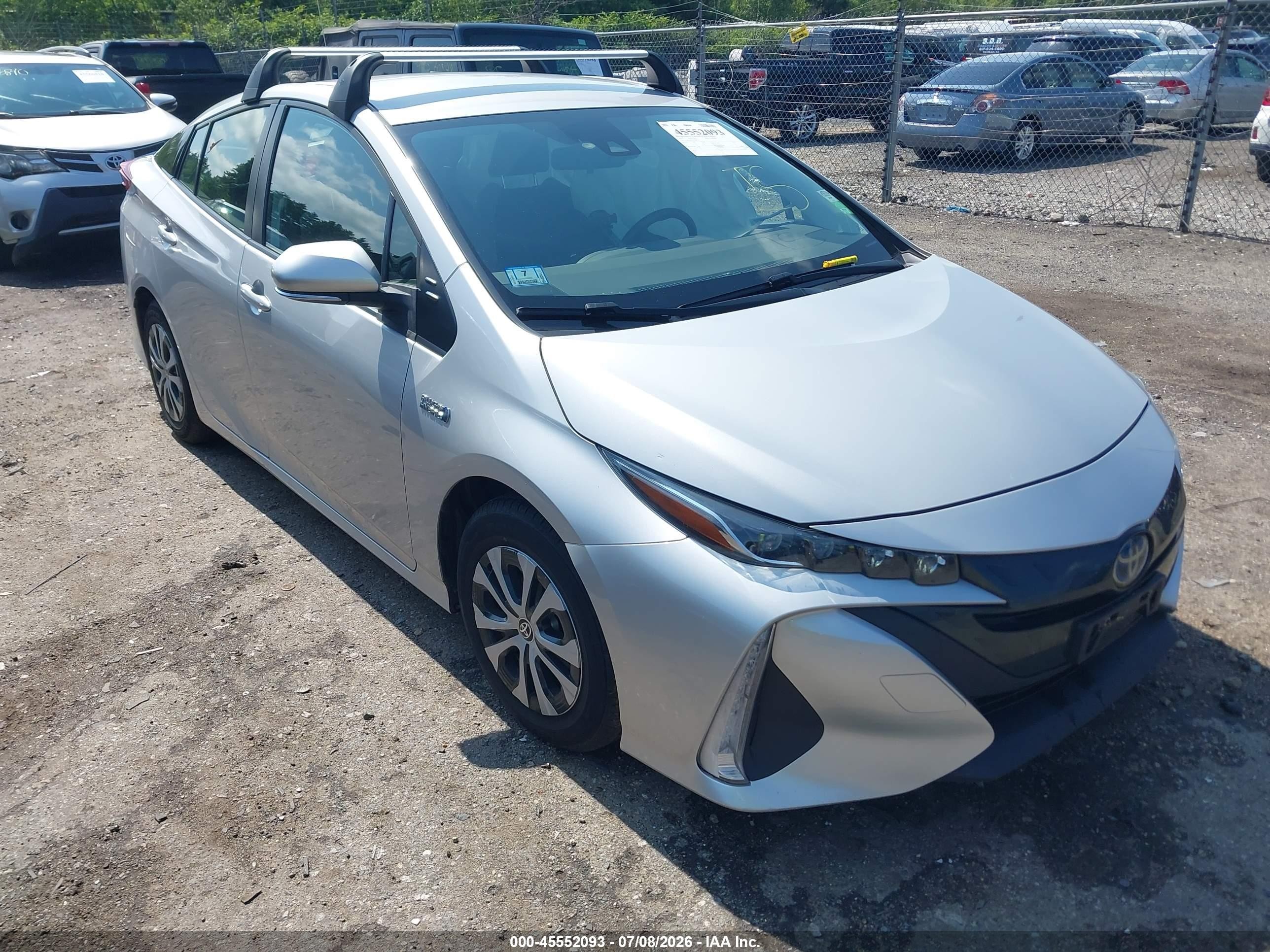 2021 Toyota Prius Limited, VIN JTDKAMFP1M3183107 — Side