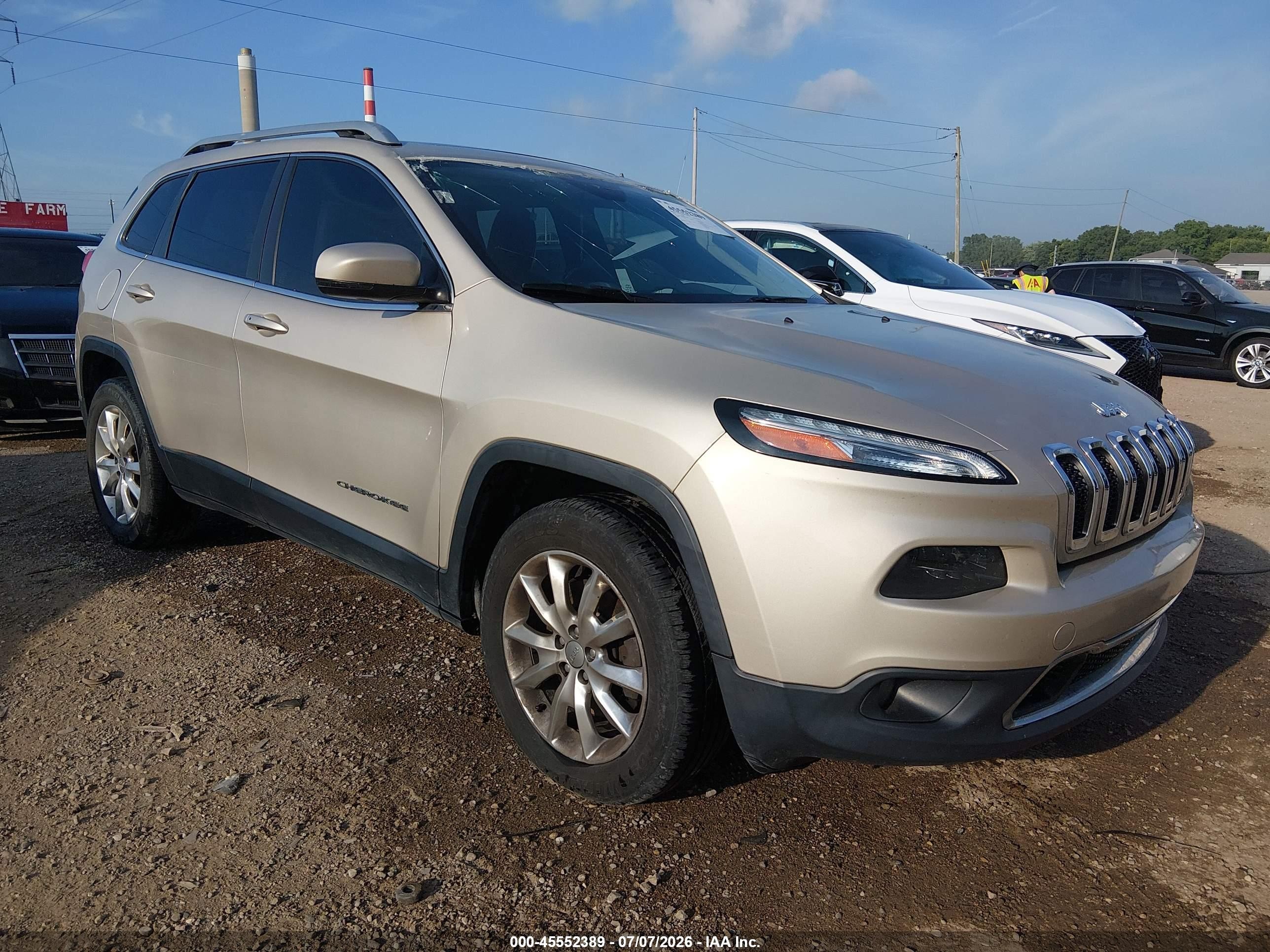 2015 Jeep Cherokee Limited, VIN 1C4PJMDB5FW557085 — Бок