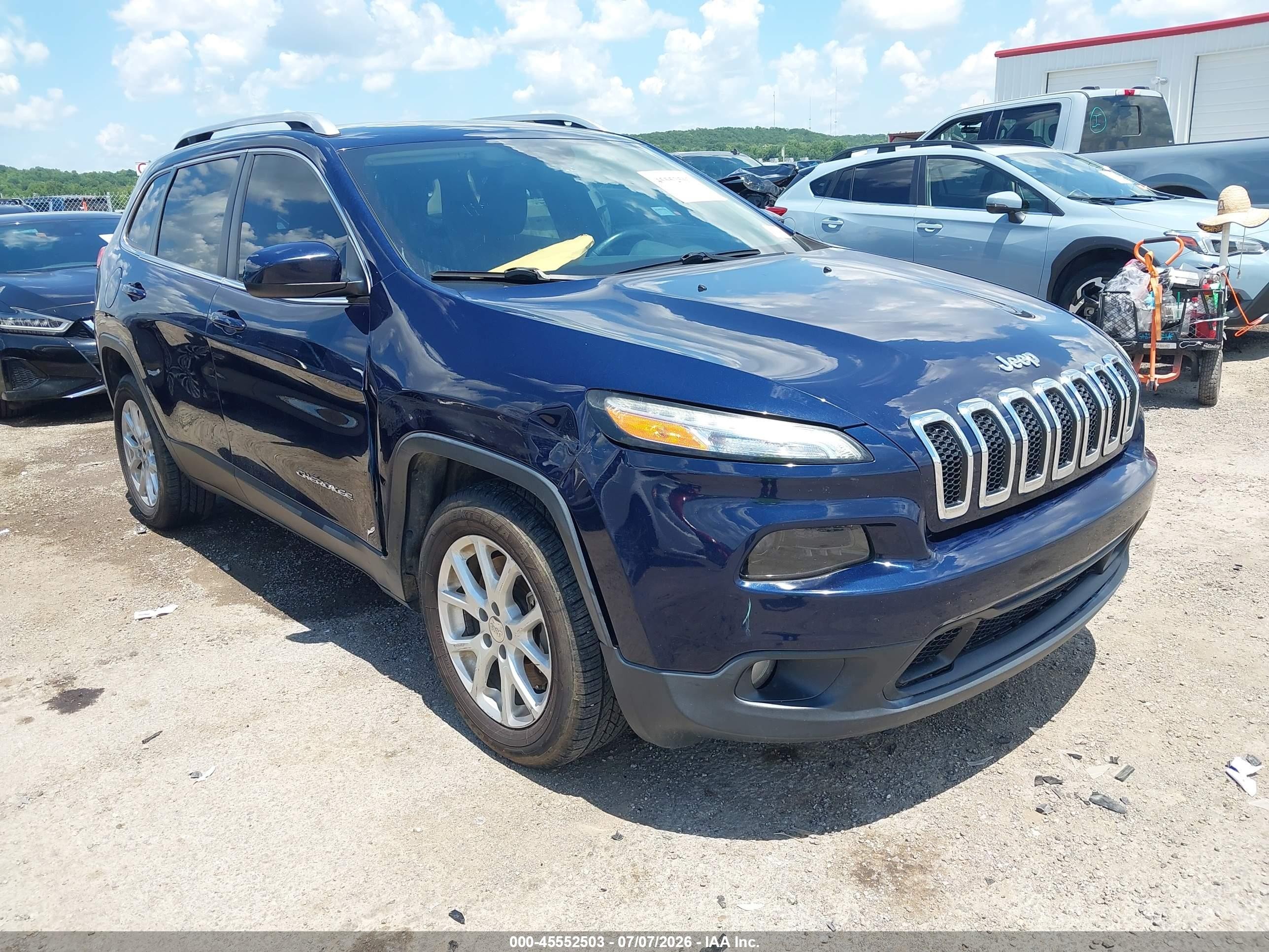 2016 Jeep Cherokee 75th Anniversary, VIN 1C4PJLCSXGW293777 — Бок