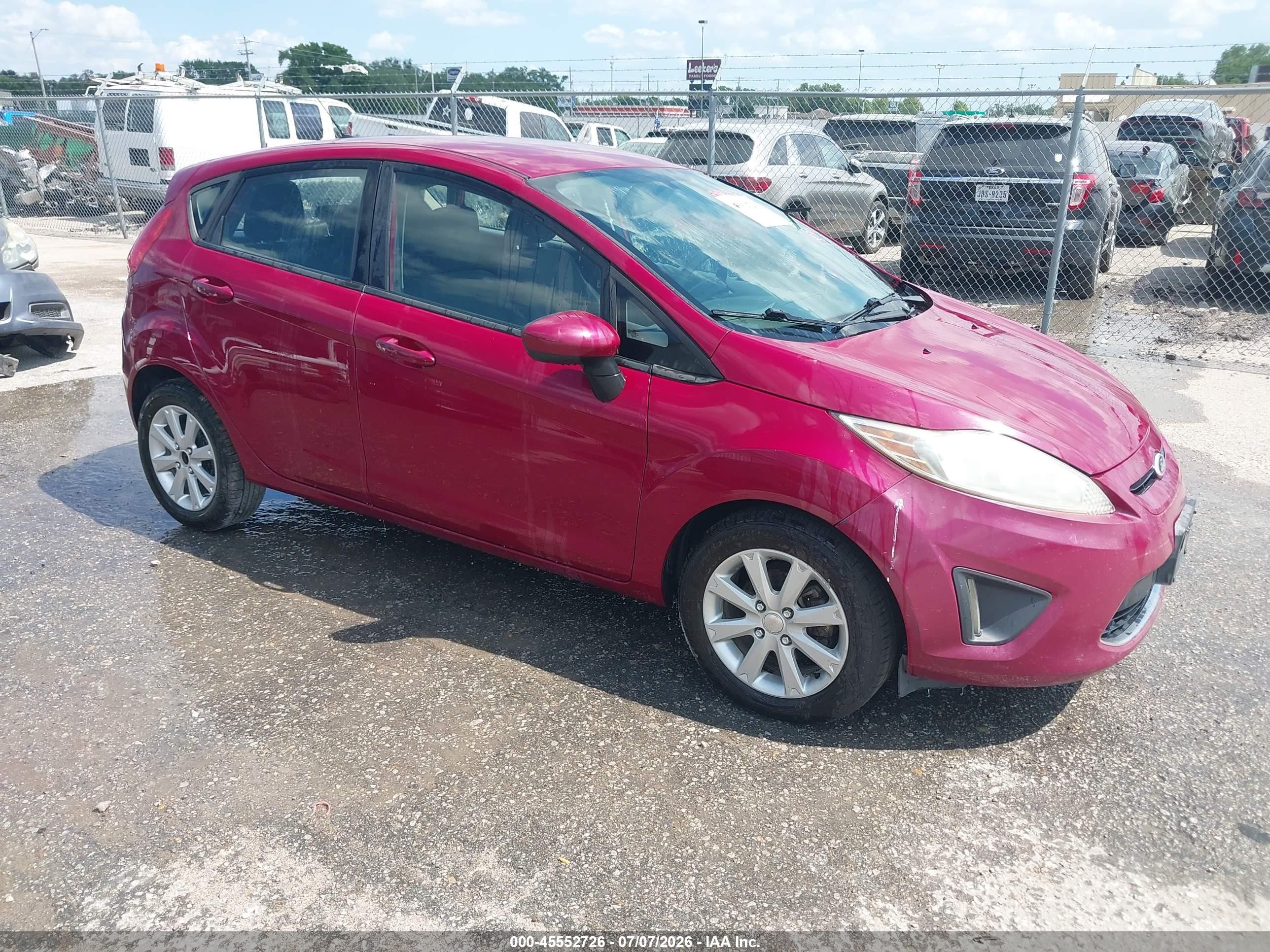 2011 Ford Fiesta SE, VIN 3FADP4EJ3BM119446 — Normal wear