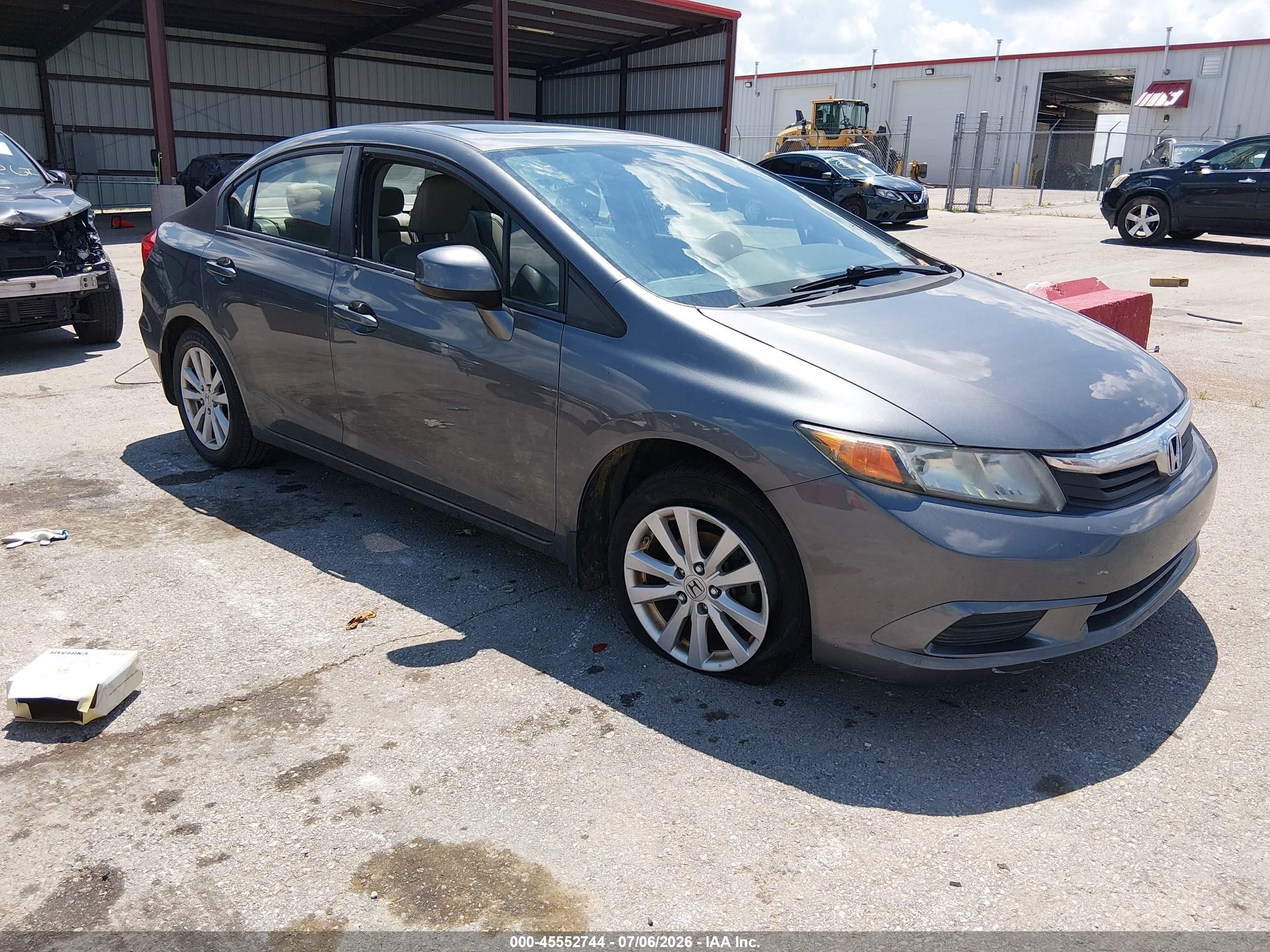 2012 Honda Civic EX-L, VIN 19XFB2F93CE042373 — Vandalism