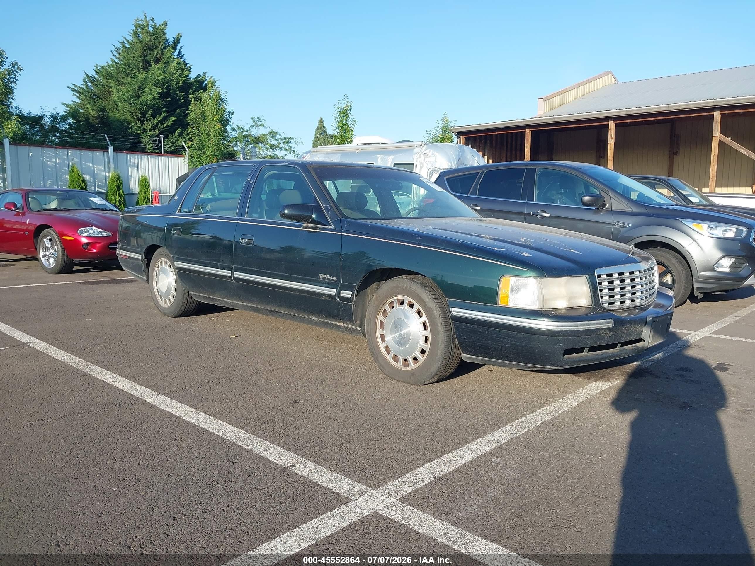 1999 Cadillac DeVille, VIN 1G6KD54Y4XU738724 — Normal wear