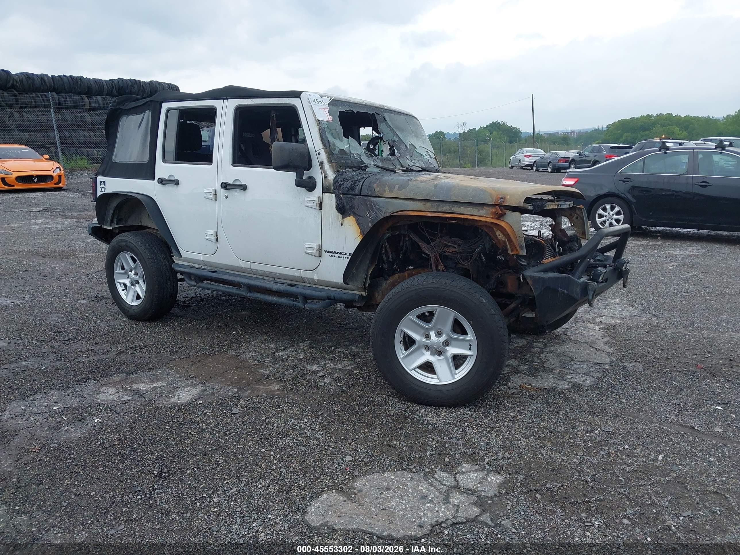 2014 Jeep Wrangler Unlimited Rubicon, VIN 1C4BJWFG0EL293451 — Пожар в моторном отсеке