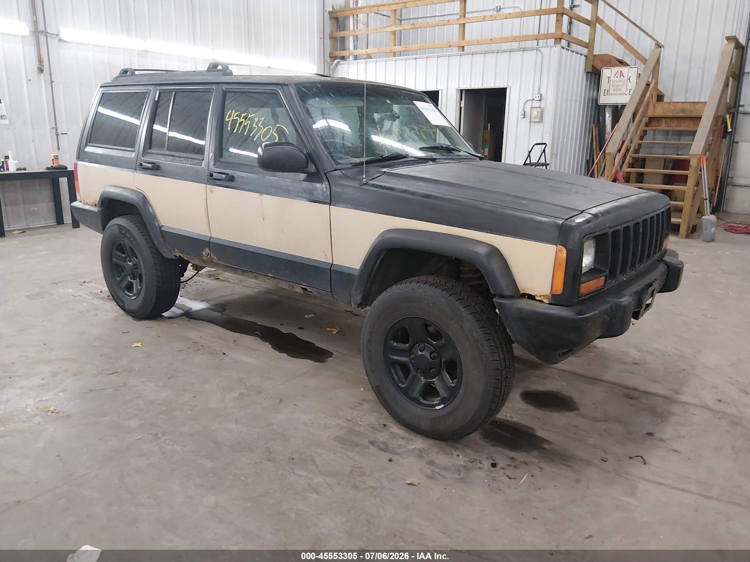 1999 Jeep Cherokee Sport, VIN 1J4FF68S9XL578859 — Normal wear