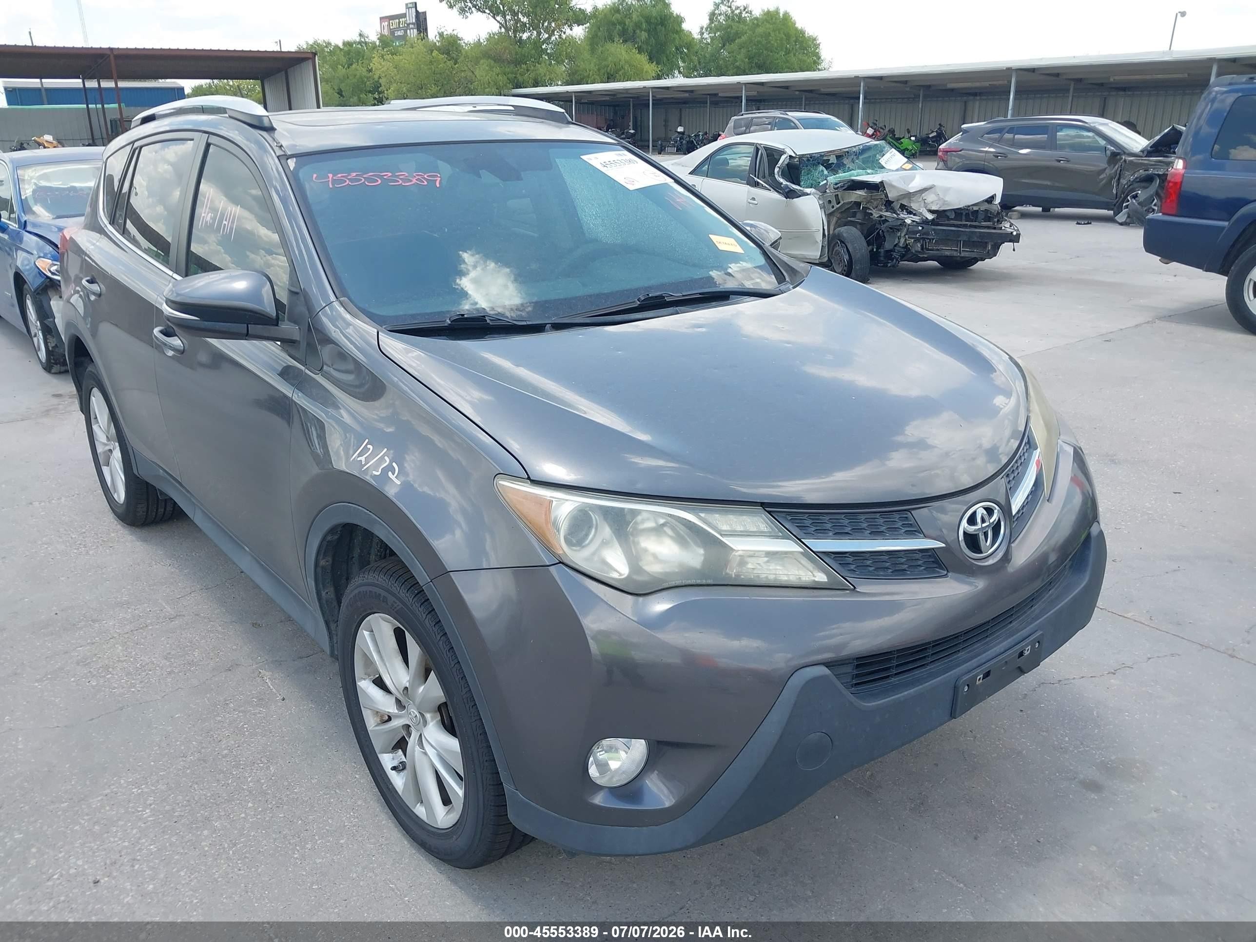 2014 Toyota RAV4 Limited, VIN 2T3DFREV8EW126408 — Side