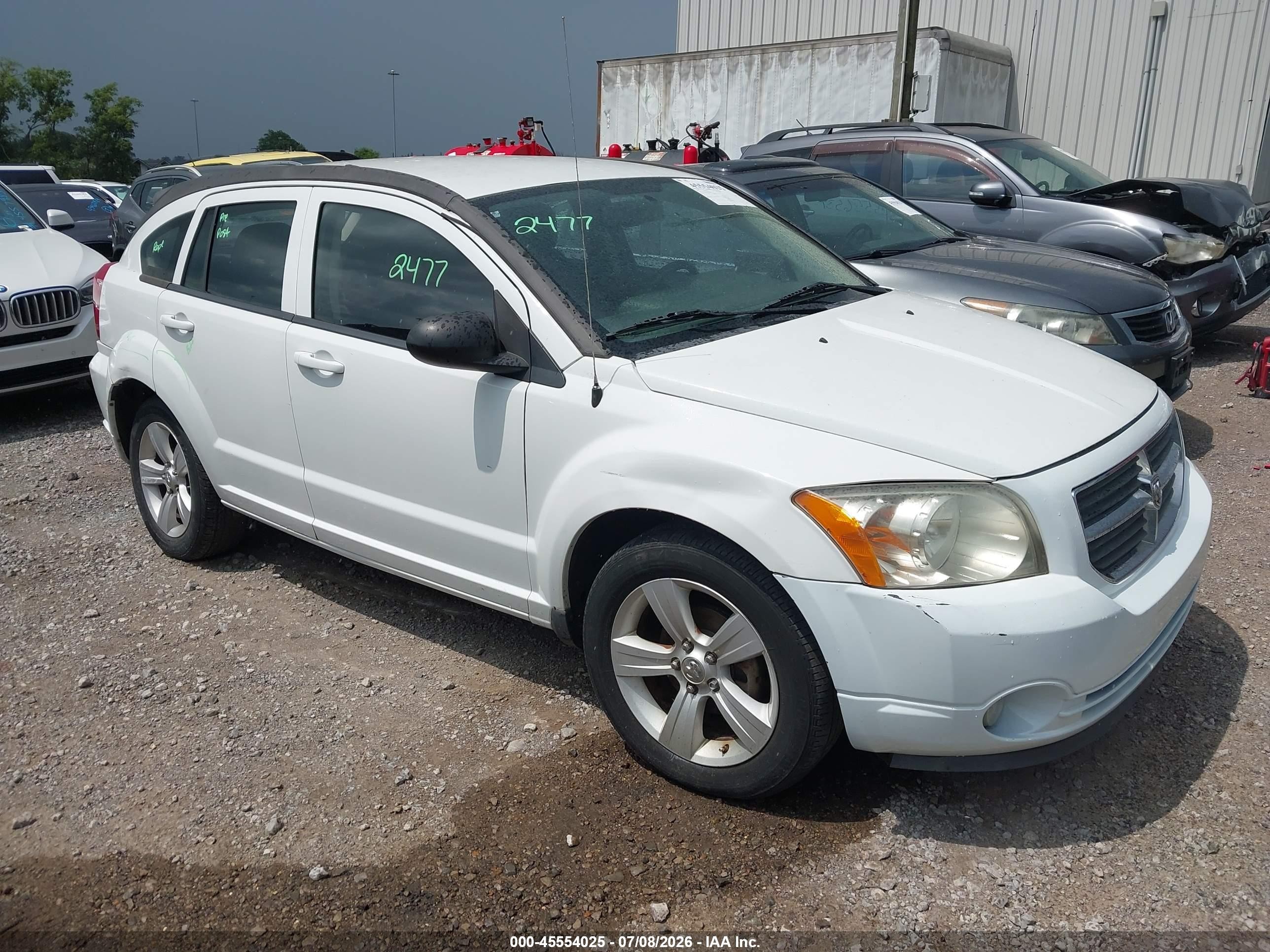 2011 Dodge Caliber Mainstreet, VIN 1B3CB3HA5BD118225 — Side