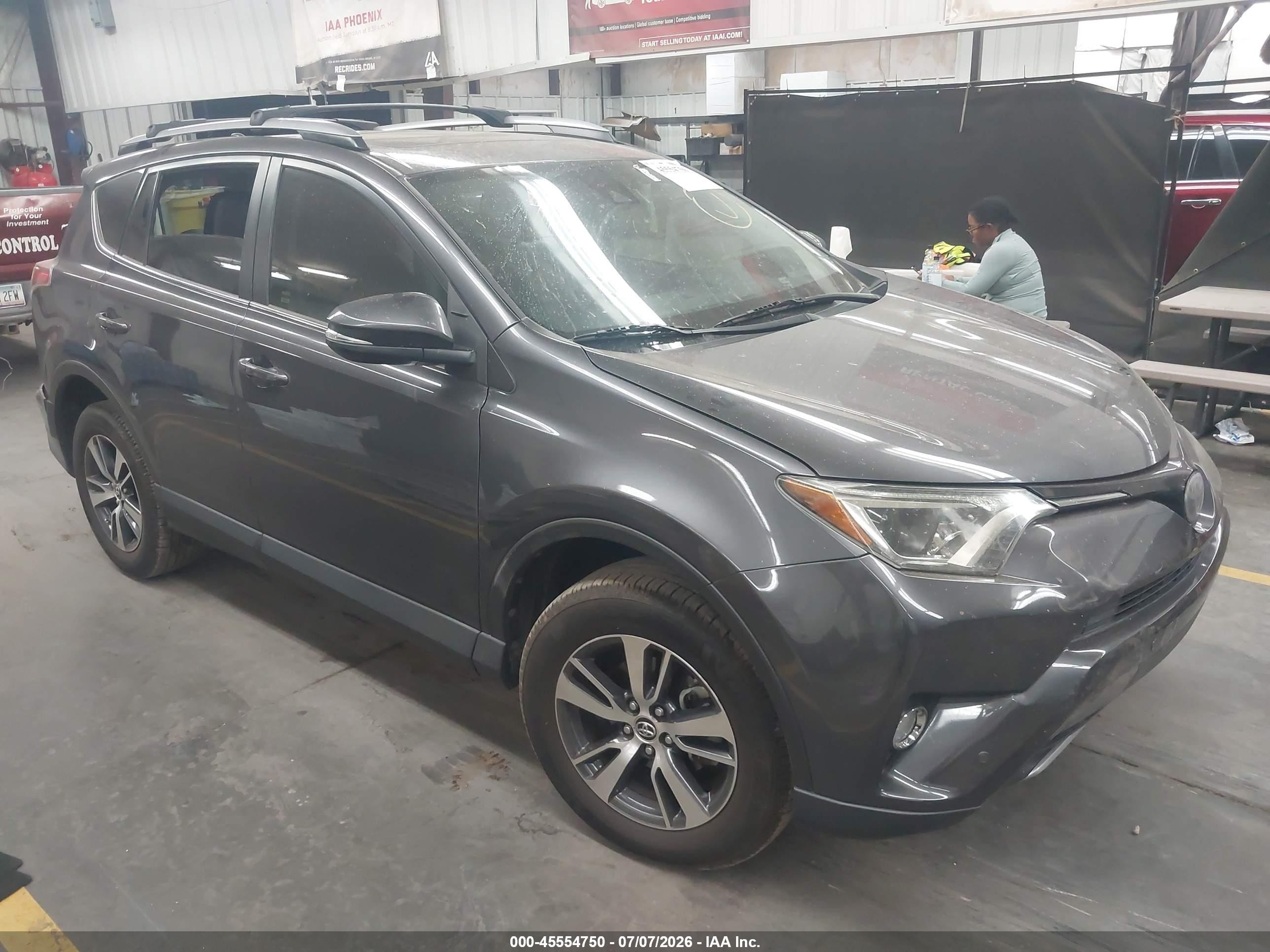 2018 Toyota RAV4 XLE, VIN JTMWFREV2JJ738900 — Rear end