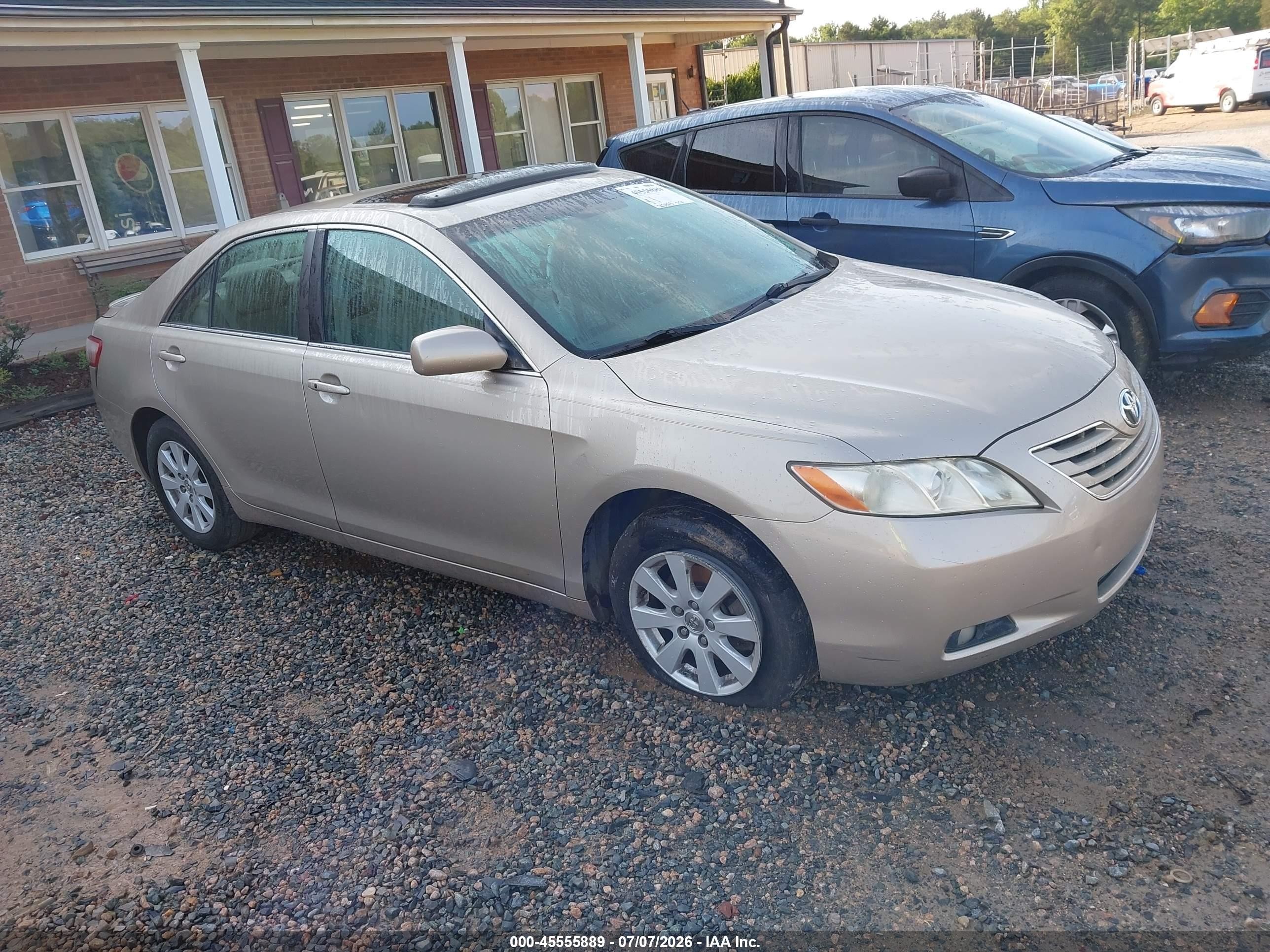 2007 Toyota Camry XLE, VIN 4T1BK46K07U051600 — Side