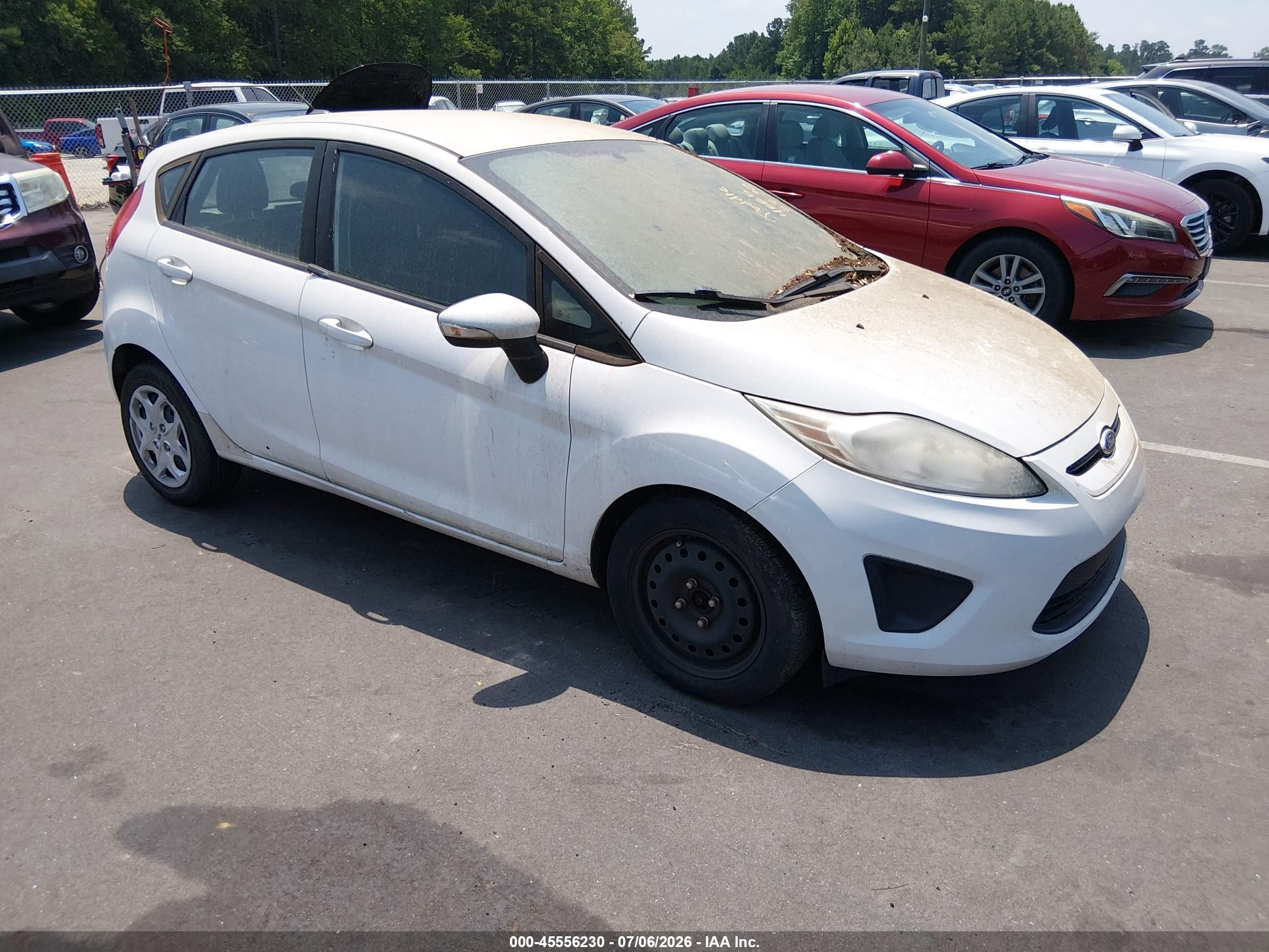 2013 Ford Fiesta SE, VIN 3FADP4EJ7DM213171 — Normal wear