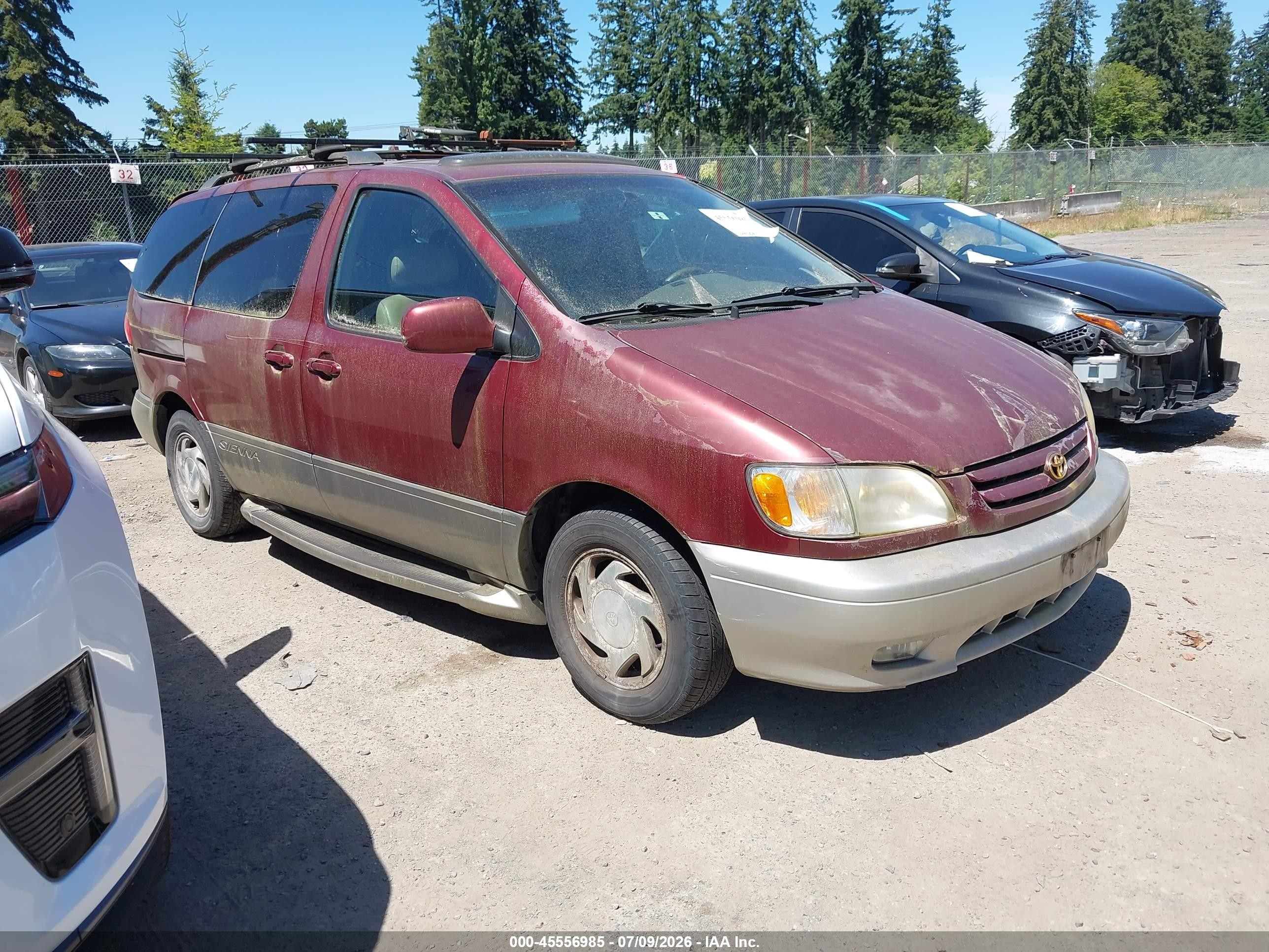 2002 Toyota Sienna LE, VIN 4T3ZF13C52U489222 — Normal wear