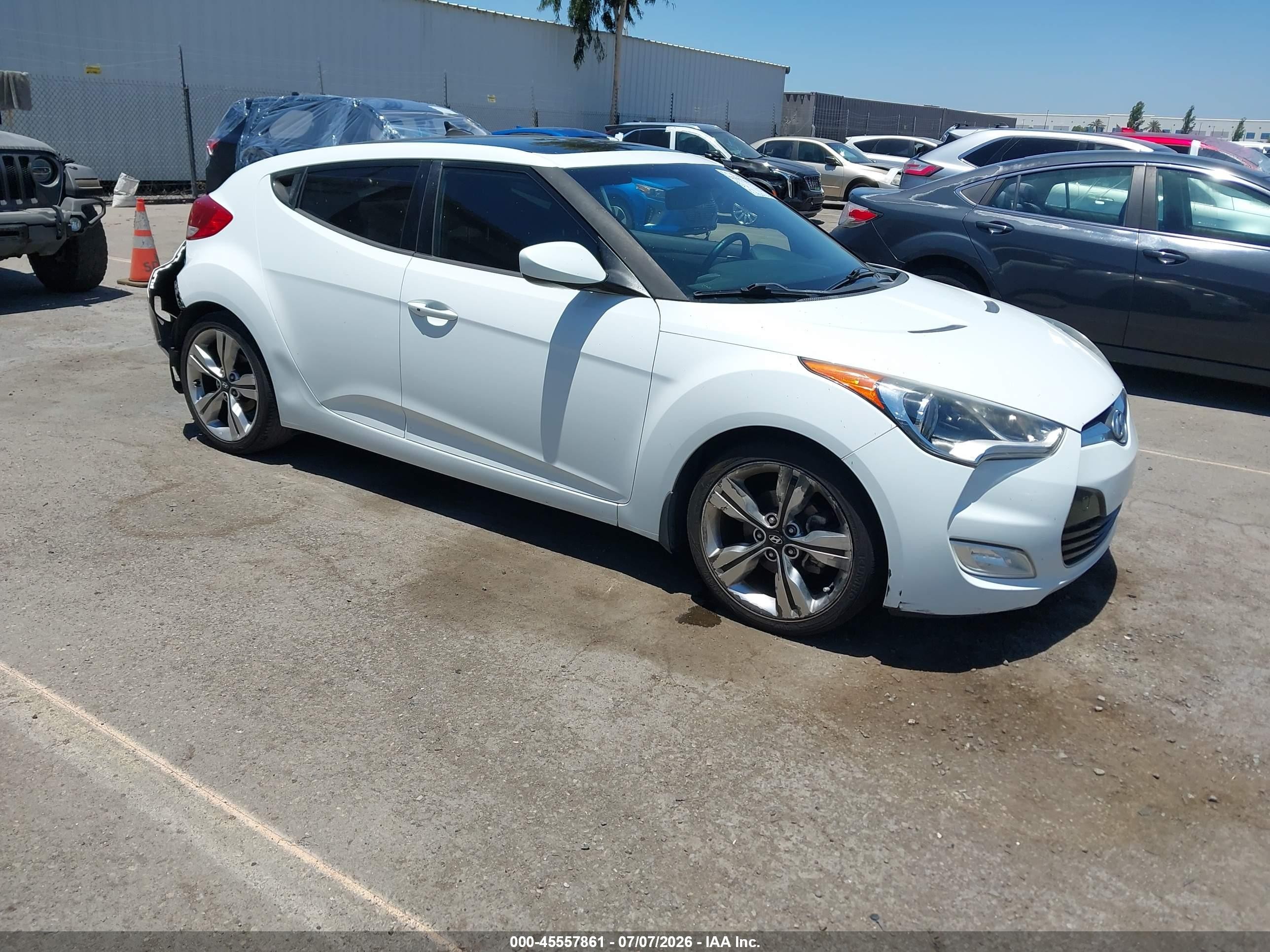 2014 Hyundai Veloster, VIN KMHTC6AD9EU208950 — Зад