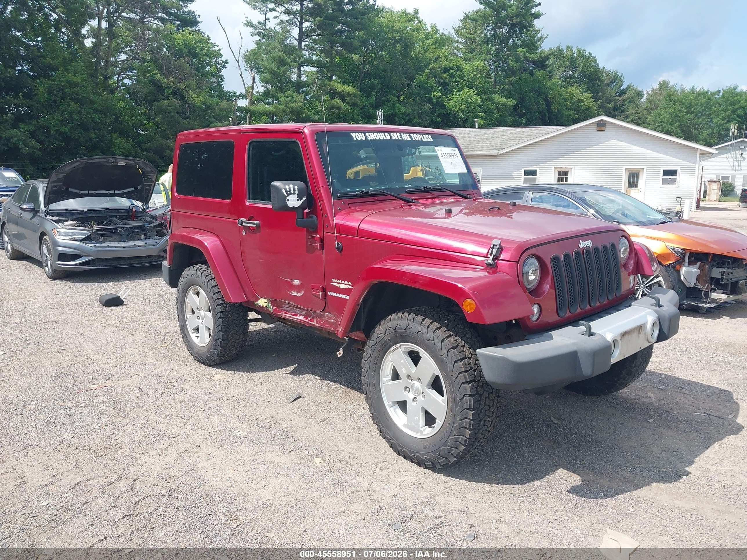 2012 Jeep Wrangler Sahara, VIN 1C4AJWBGXCL152207 — Side
