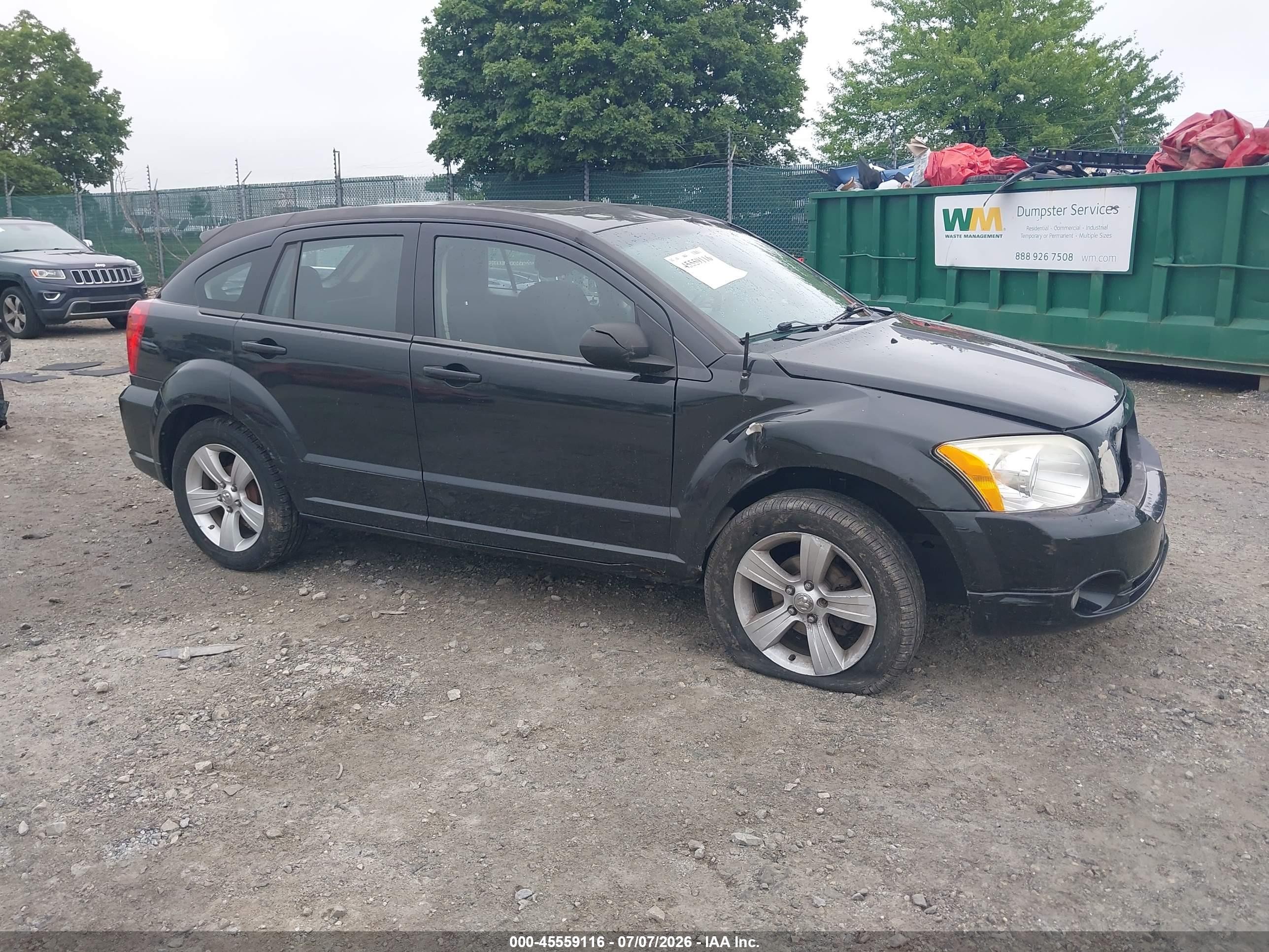 2011 Dodge Caliber Mainstreet, VIN 1B3CB3HA3BD116506 — Side