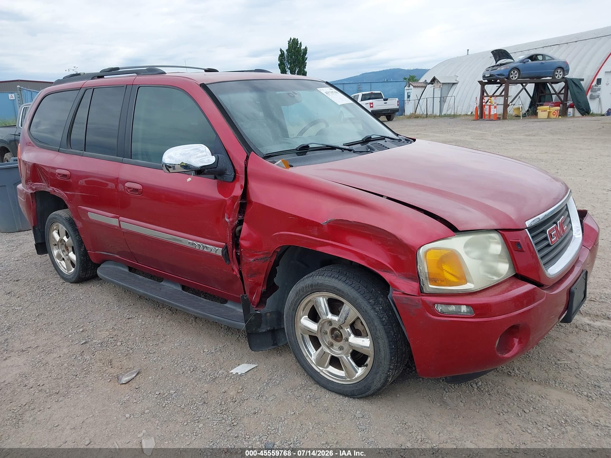 2002 GMC Envoy SLE, VIN 1GKDT13S422347449 — Side