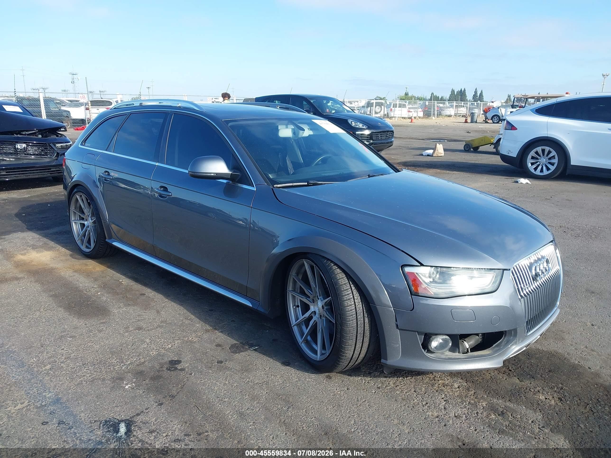 2014 Audi allroad A4 Premium Plus, VIN WA1UFAFL5EA106737 — Side