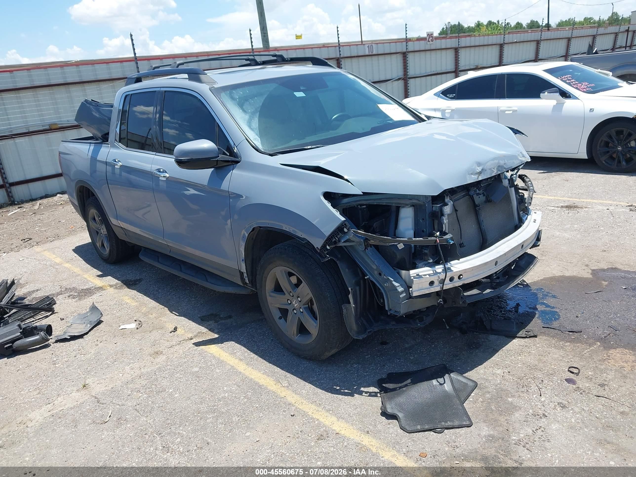 2023 Honda Ridgeline RTL-E, VIN 5FPYK3F72PB051621 — Front end