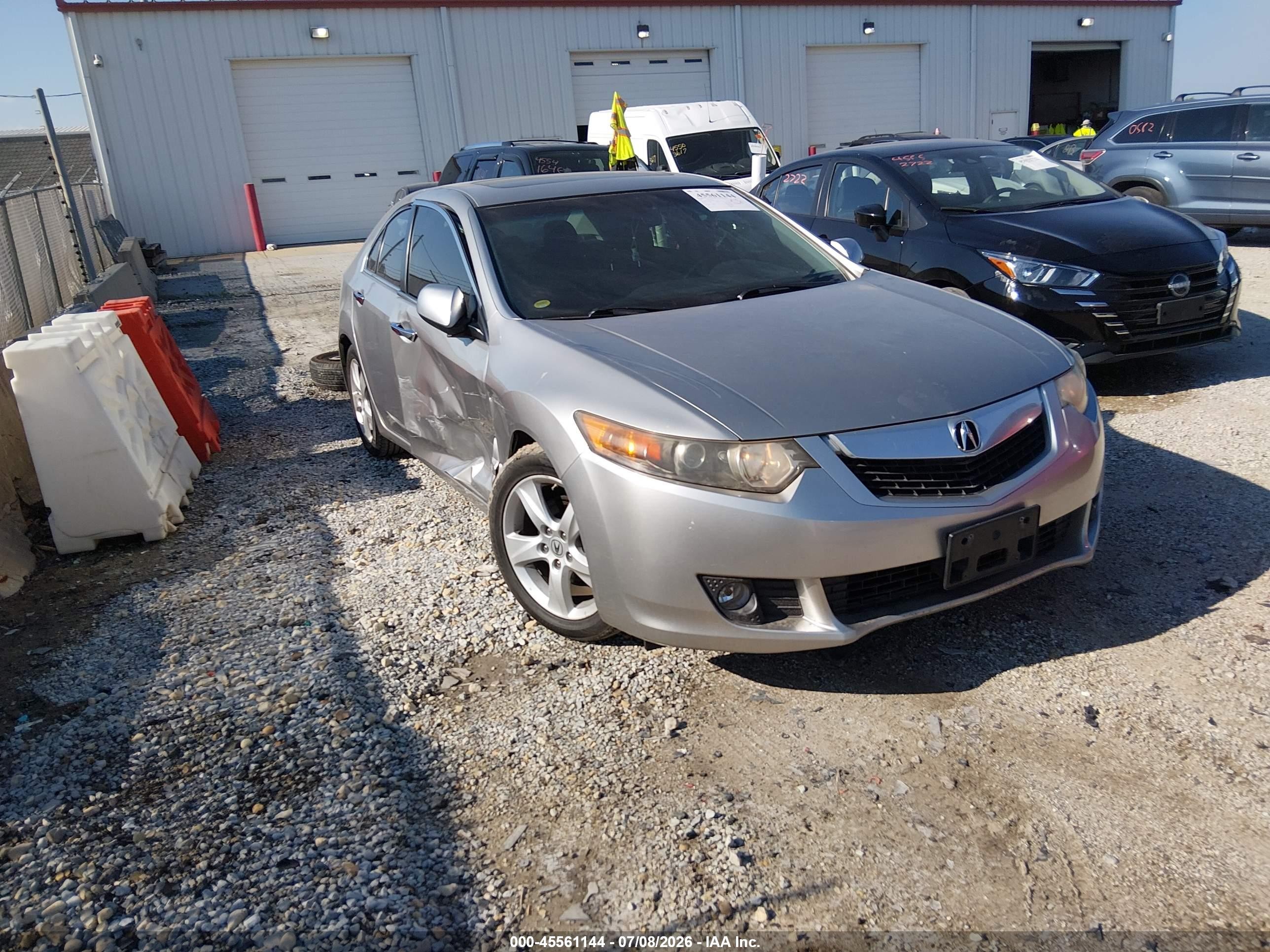 2010 Acura TSX, VIN JH4CU2F69AC011053 — Бок