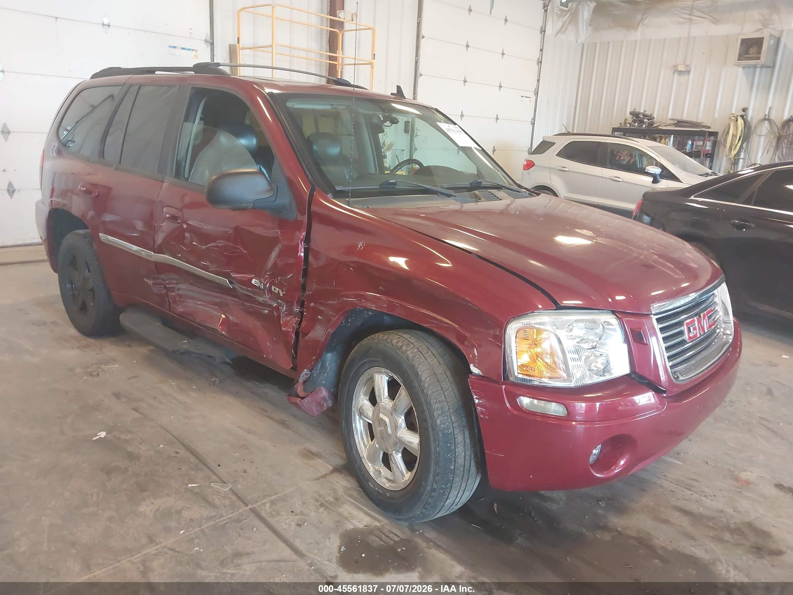 2006 GMC Envoy SLT, VIN 1GKDT13S562197938 — Бок