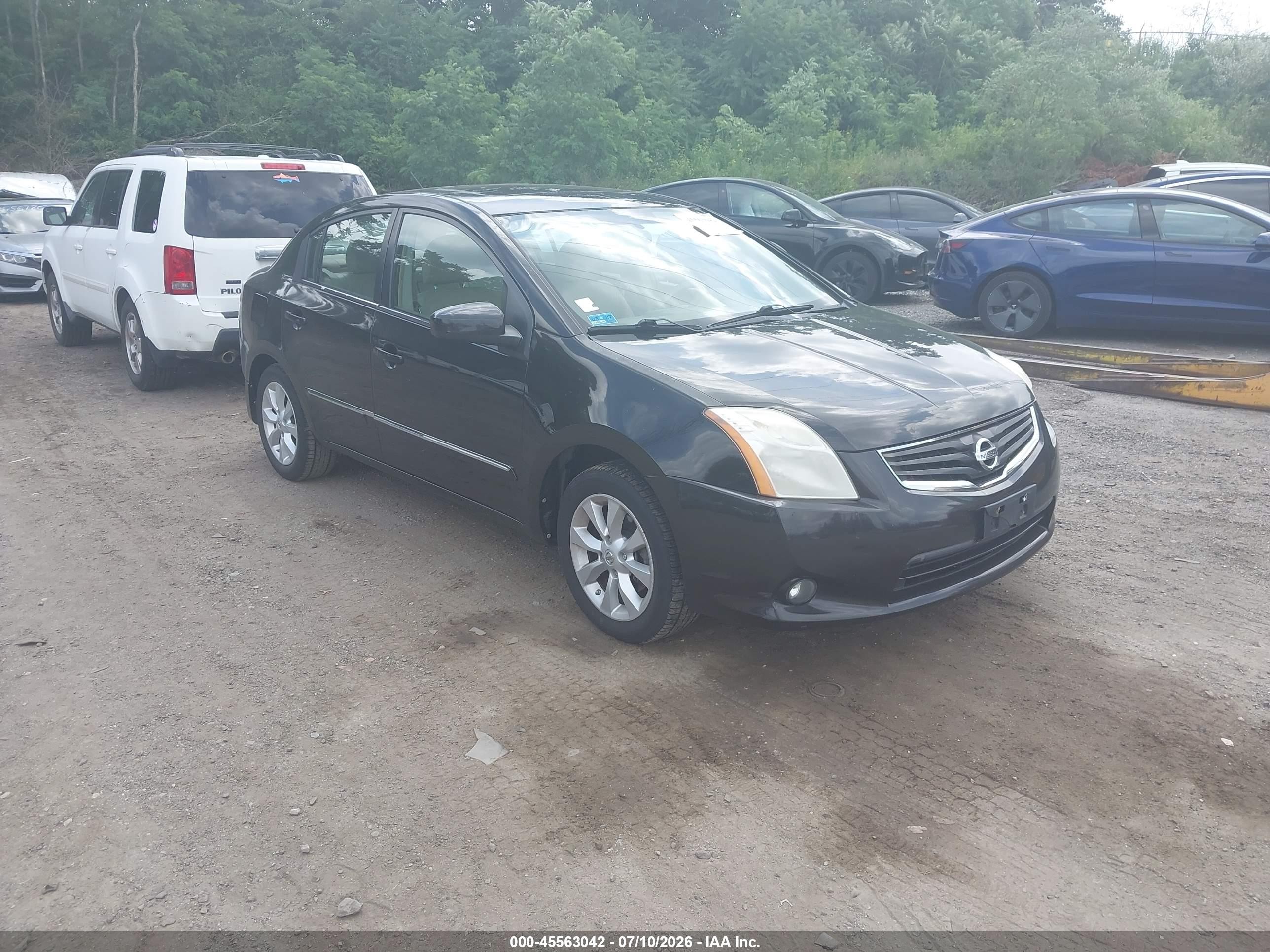 2010 Nissan Sentra SR, VIN 3N1AB6AP1AL639847 — Бок
