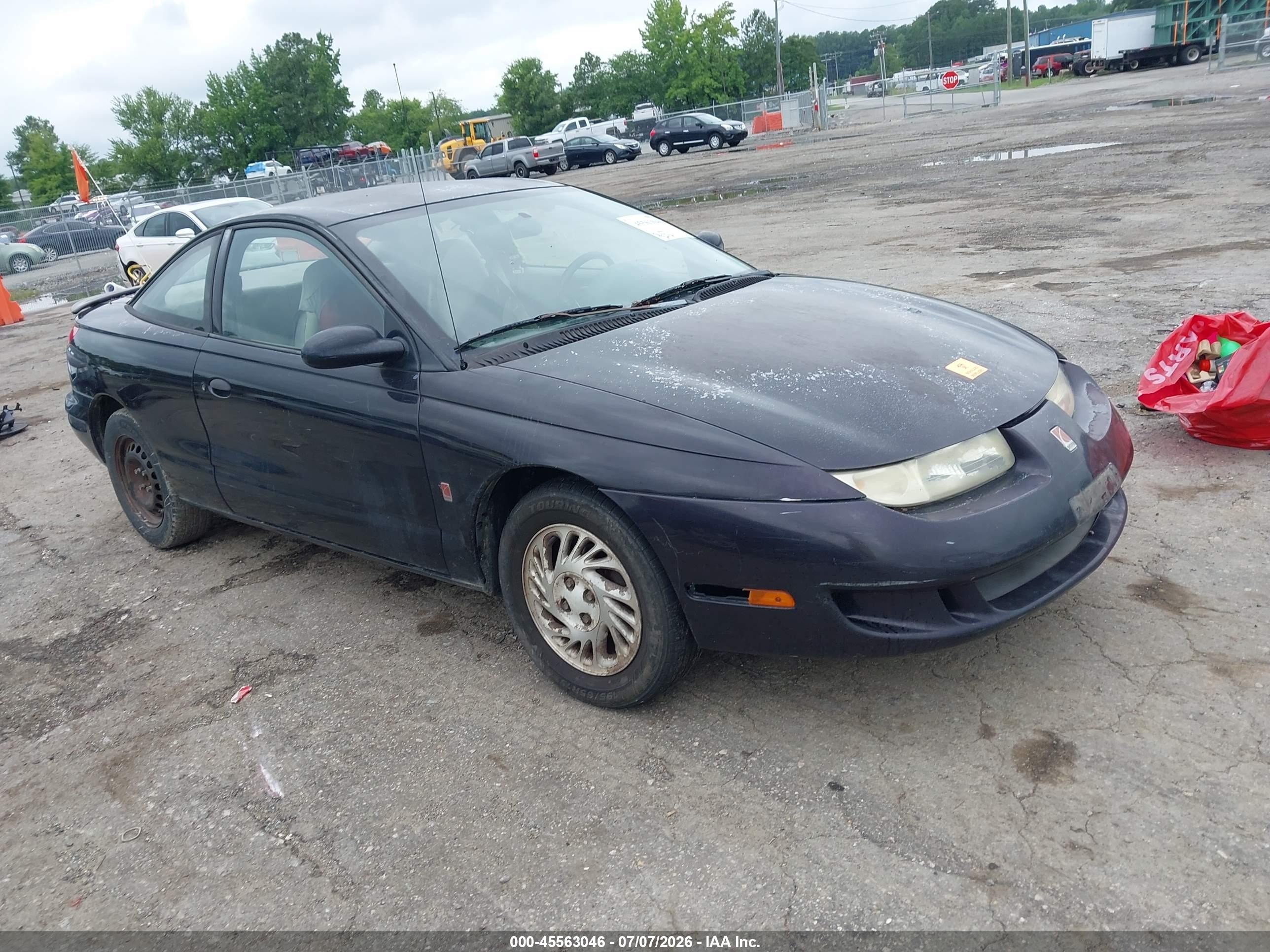 1999 Saturn SC, VIN 1G8ZP1285XZ352132 — Бок