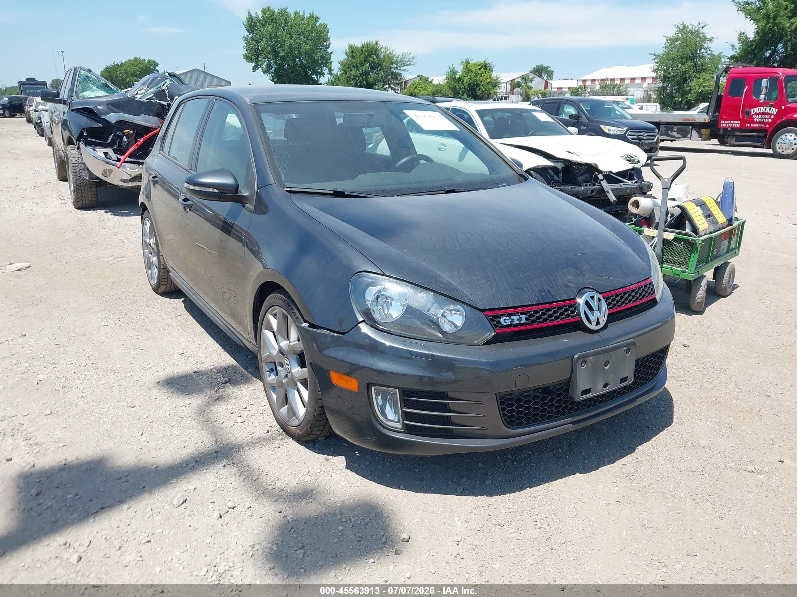 2014 Volkswagen Golf GTI Wolfsburg Edition, VIN WVWGD7AJ1EW000130 — Rear end