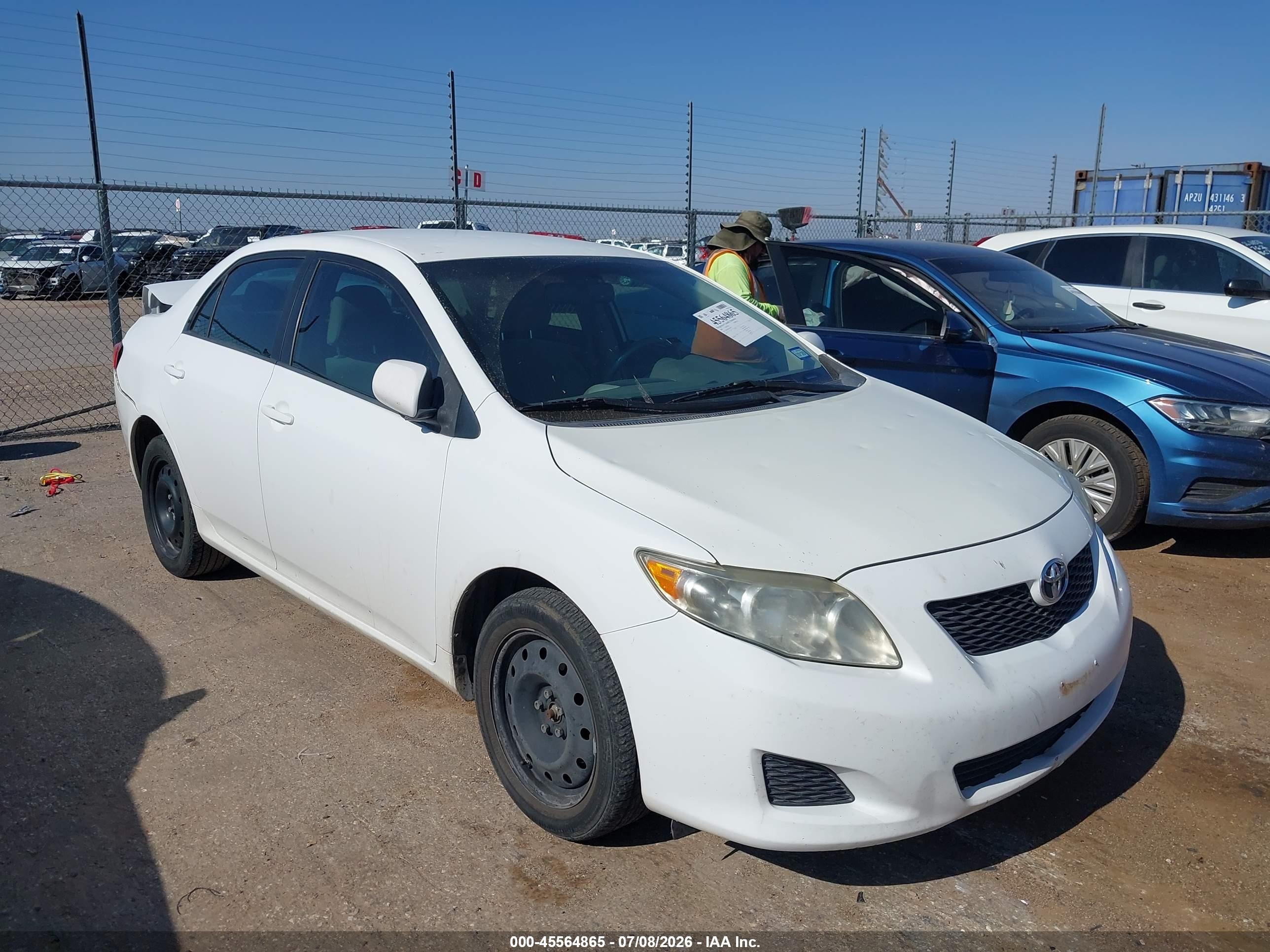 2009 Toyota Corolla LE, VIN 1NXBU40E69Z109077 — Rear end
