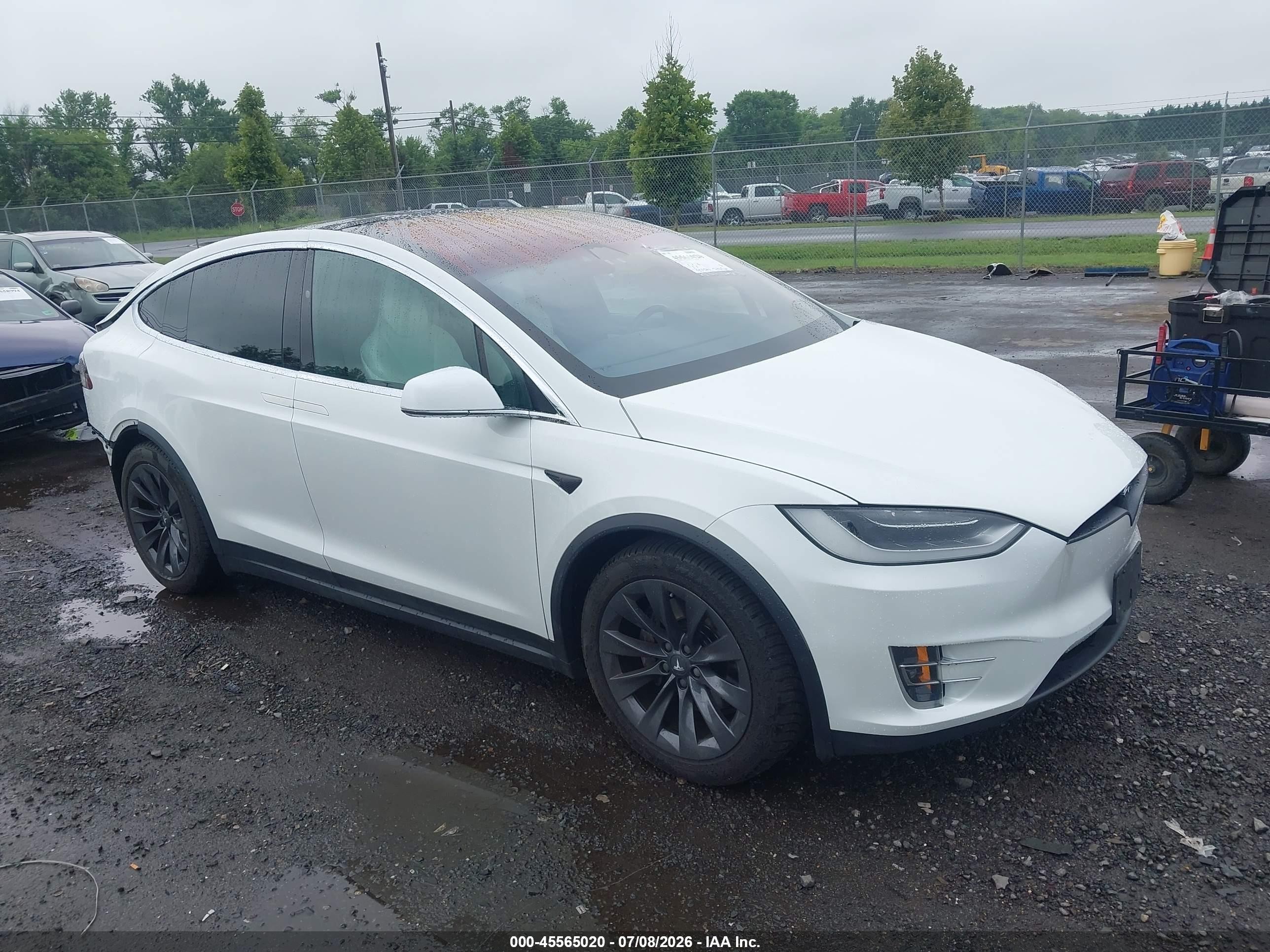 2017 Tesla Model X 90D, VIN 5YJXCDE25HF076494 — Rear end