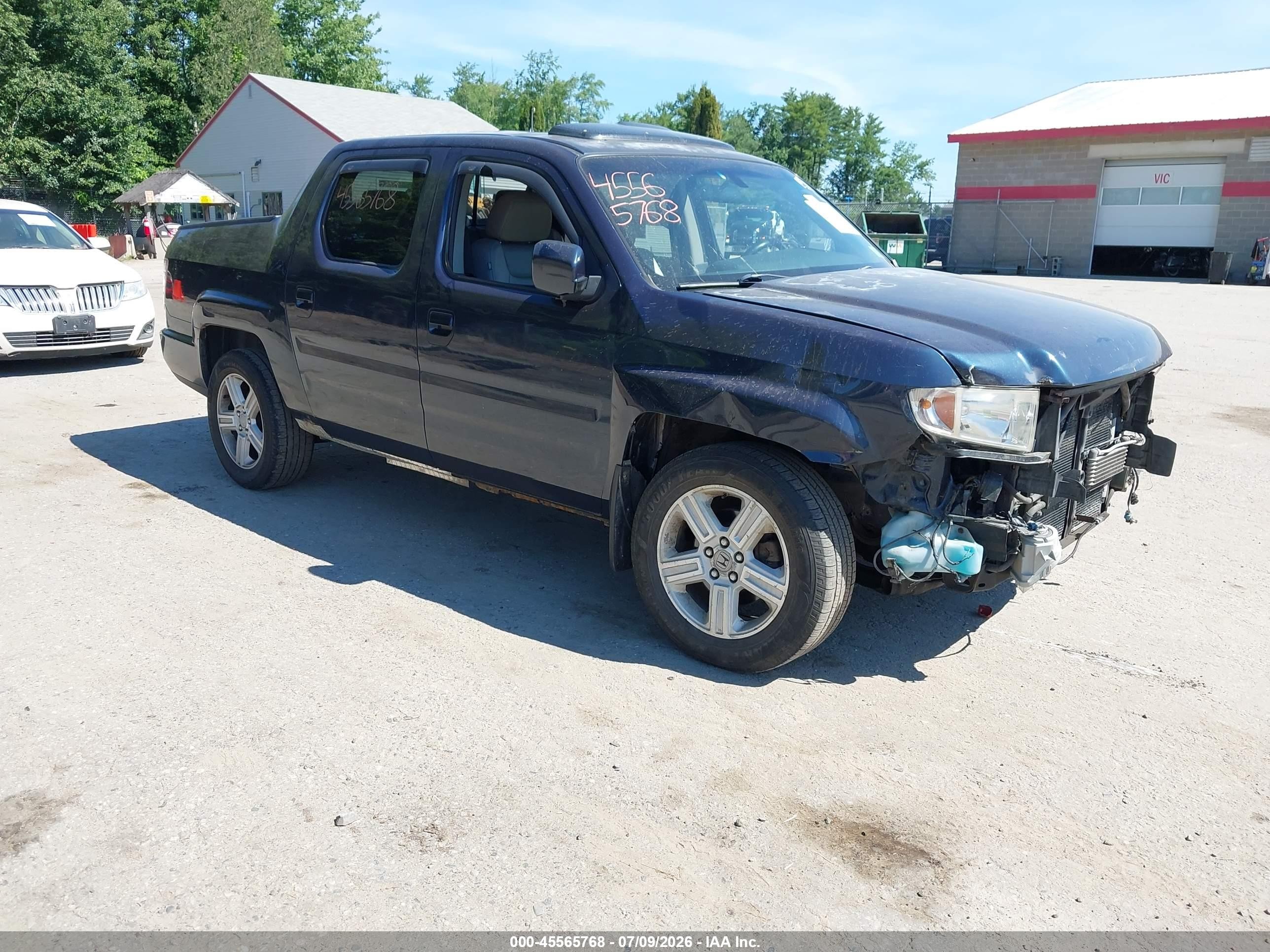2011 Honda Ridgeline RTL, VIN 5FPYK1F54BB001511 — Normal wear
