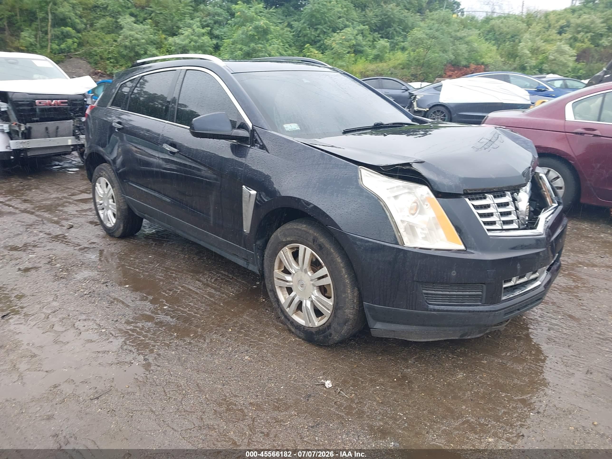 2014 Cadillac SRX Luxury Collection, VIN 3GYFNEE3XES531583 — Front end