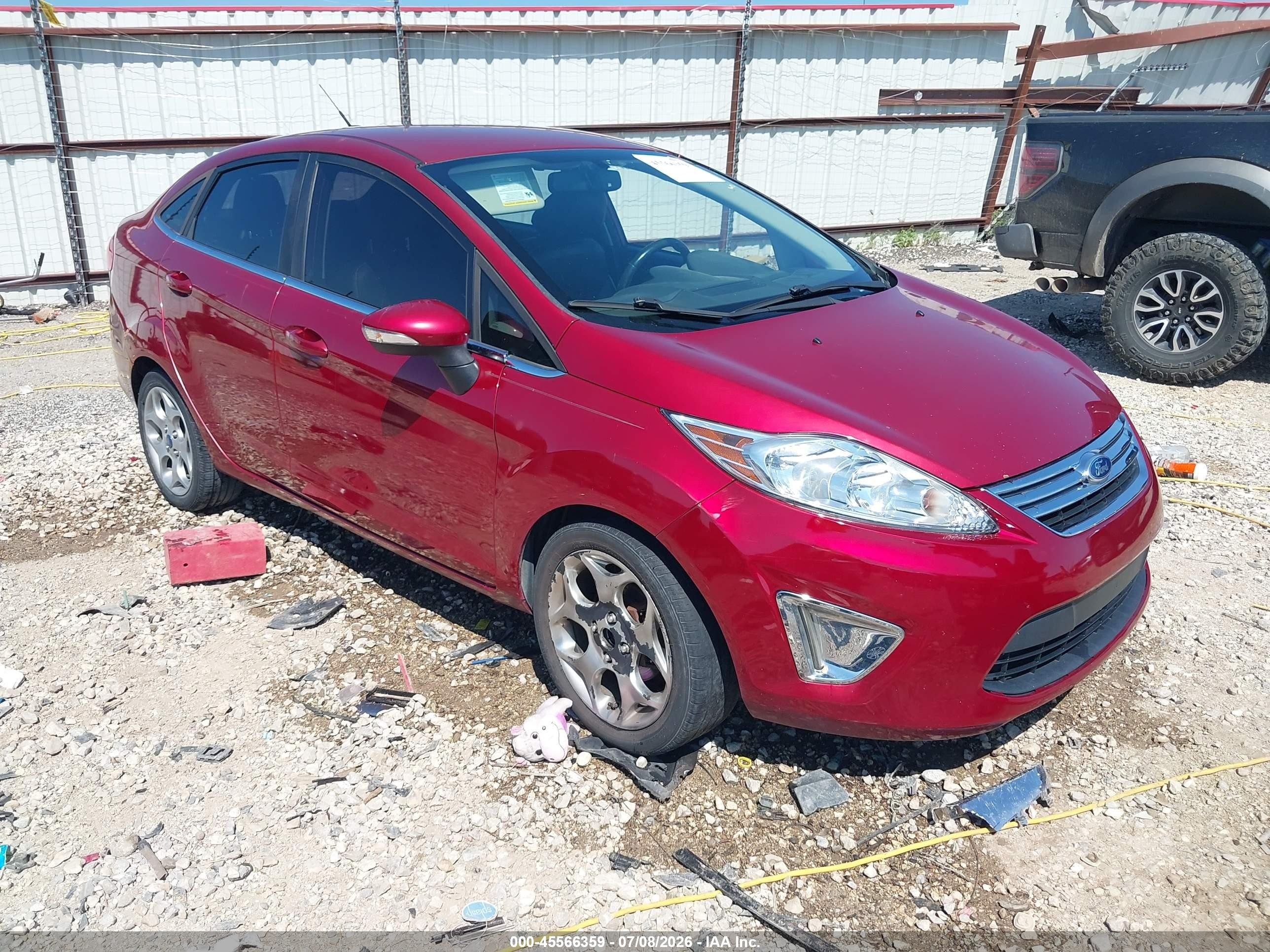 2013 Ford Fiesta Titanium, VIN 3FADP4CJ9DM118890 — Rear end