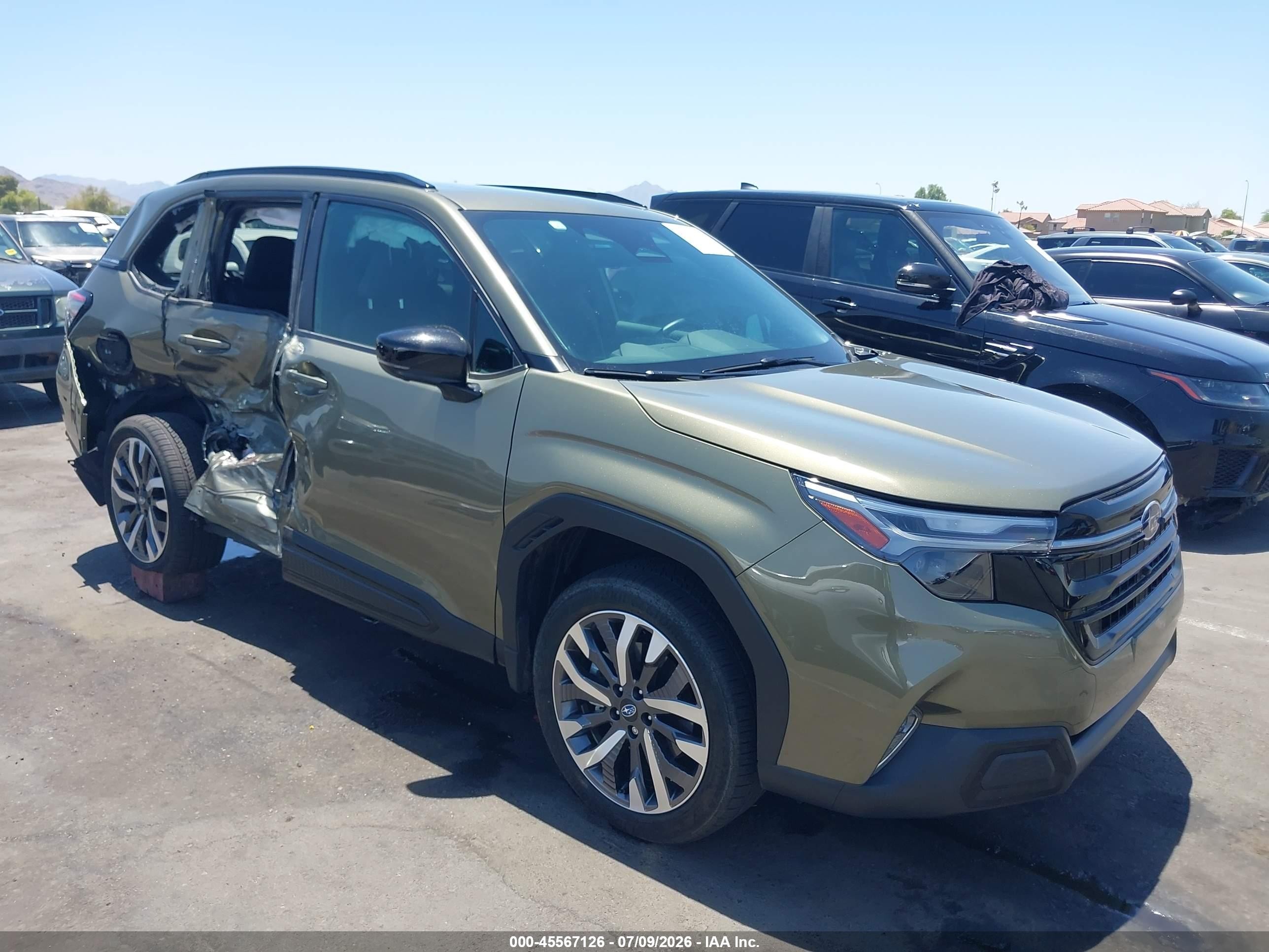 2026 Subaru Forester Touring, VIN 4S4SLDT63T3012584 — Бок