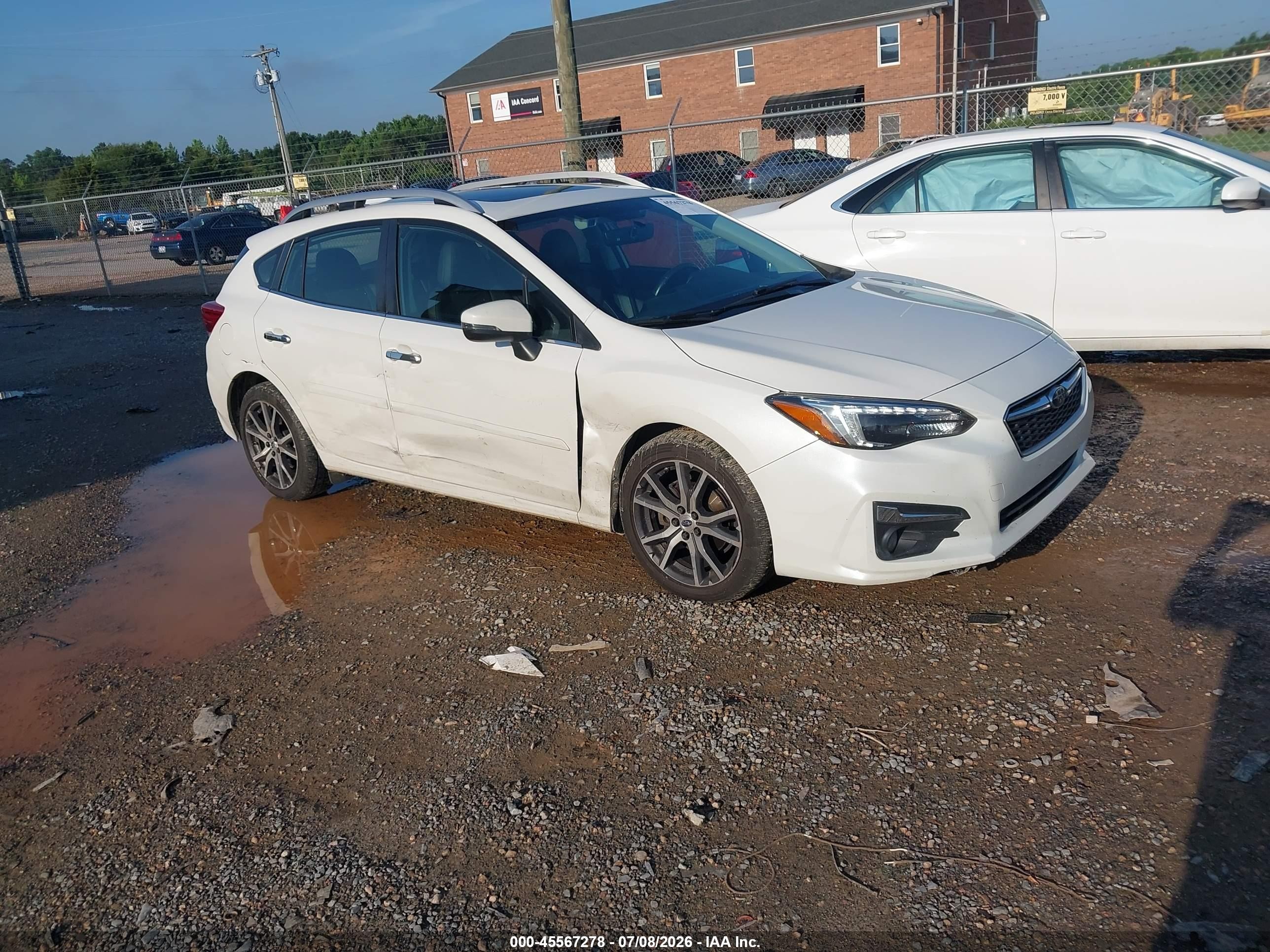2017 Subaru Impreza Limited, VIN 4S3GTAT65H3749897 — Side