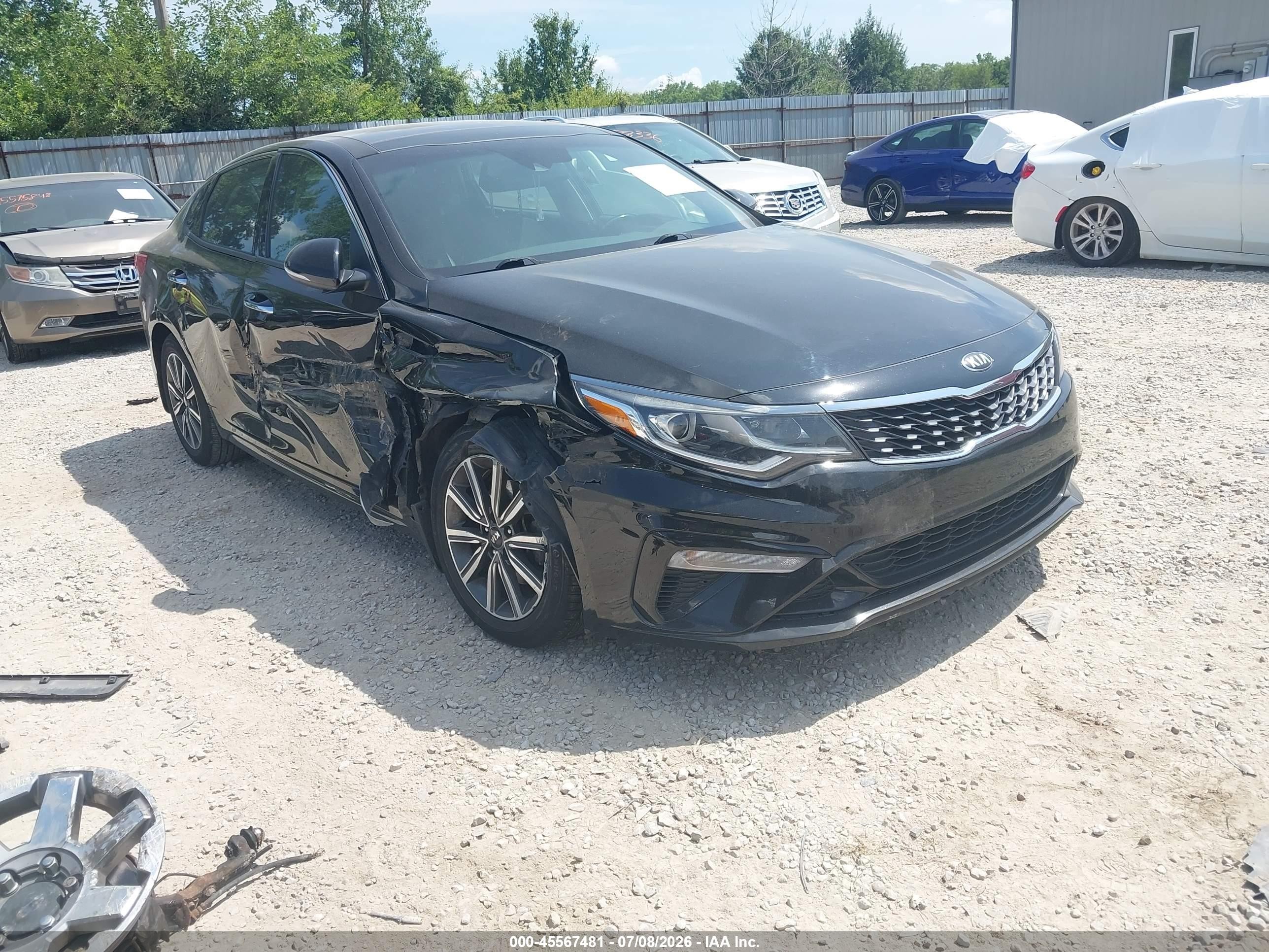 2019 Kia Optima LX, VIN 5XXGT4L3XKG332208 — Side