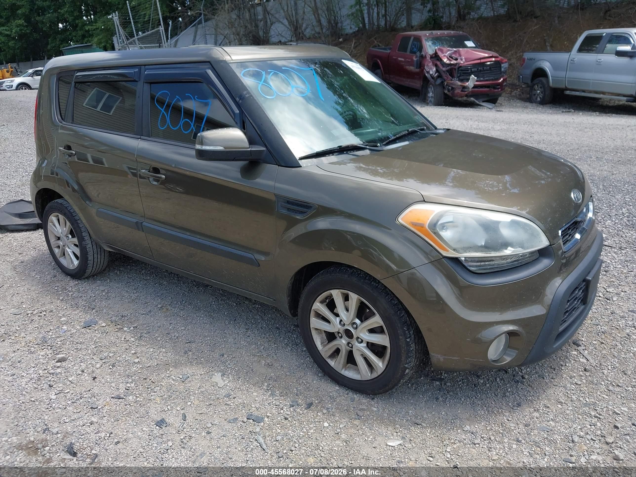 2012 Kia Soul +, VIN KNDJT2A64C7412587 — Side
