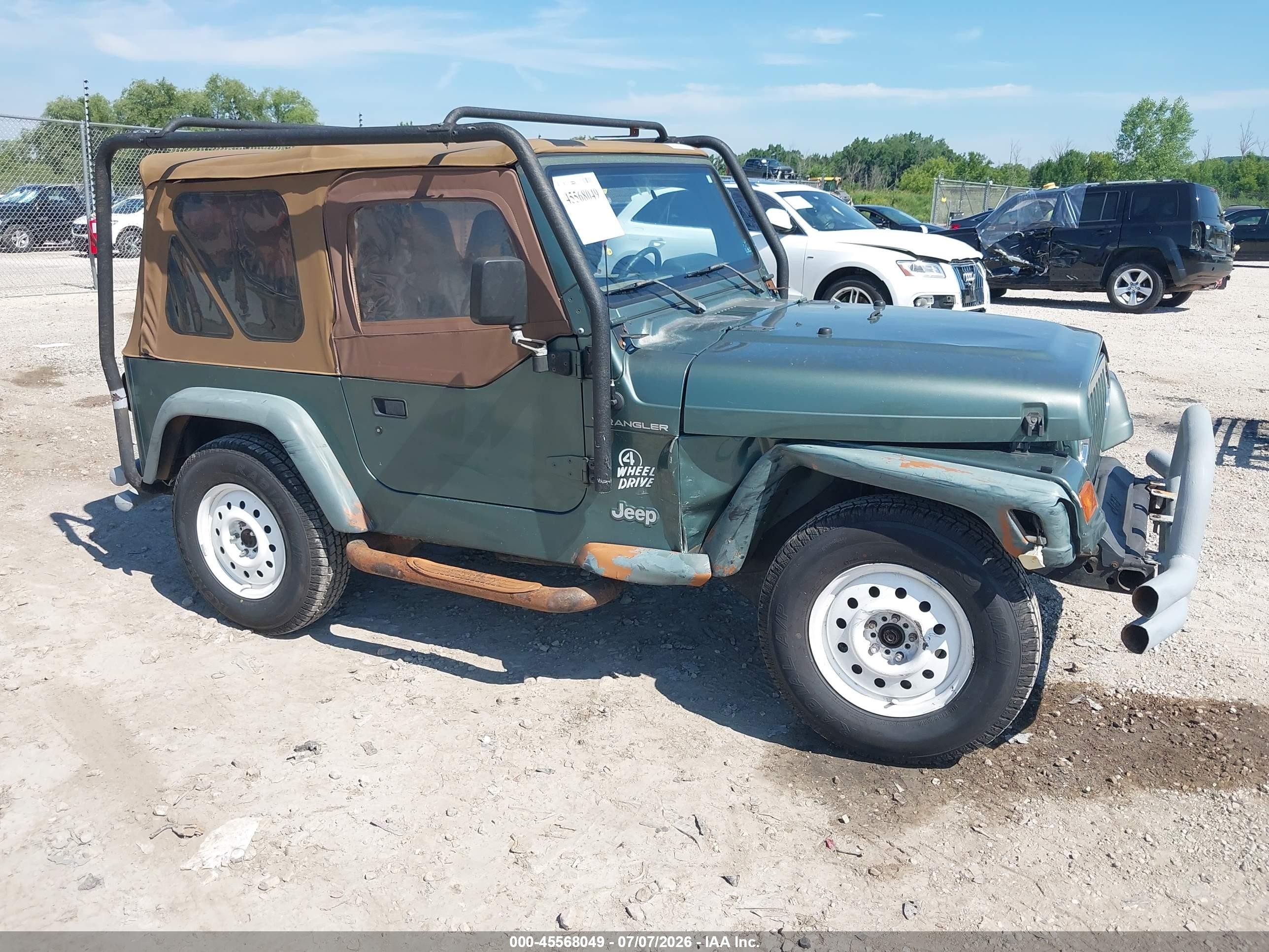 1999 Jeep Wrangler SE, VIN 1J4FY29P2XP456687 — Front end