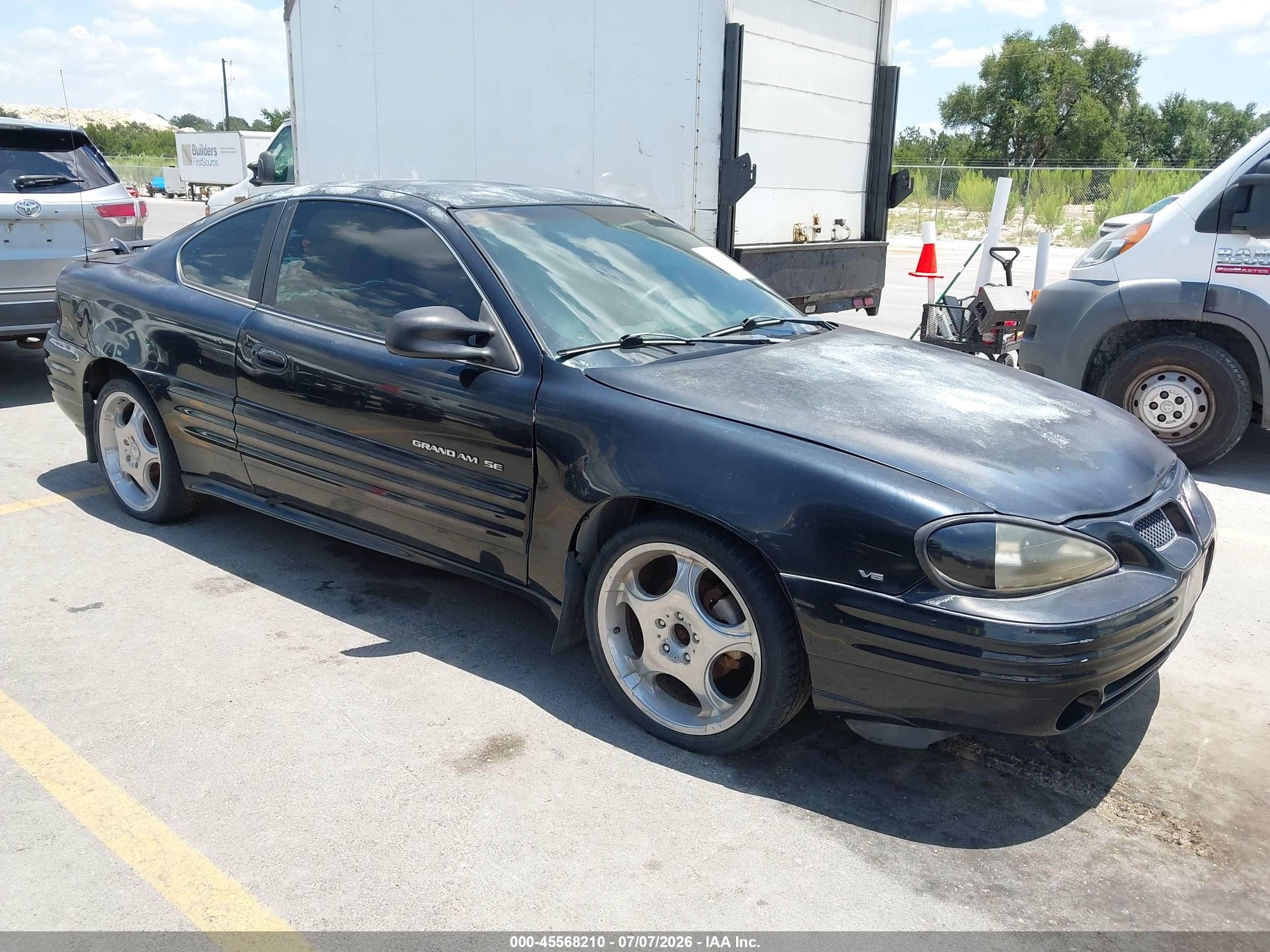 2000 Pontiac Grand Am, VIN 1G2NF12E6YM747887 — Normal wear