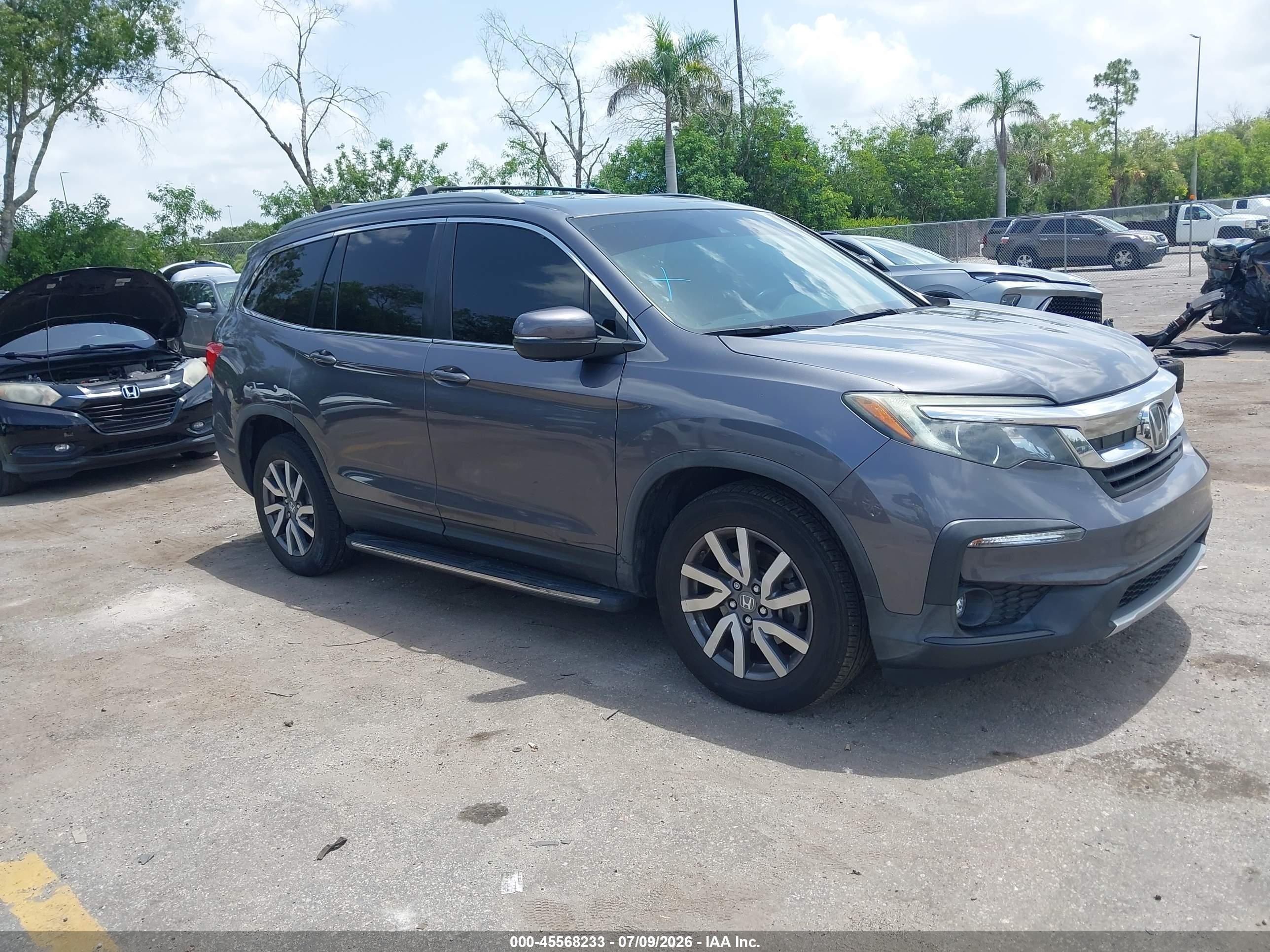 2020 Honda Pilot EX-L, VIN 5FNYF6H52LB033477 — Side
