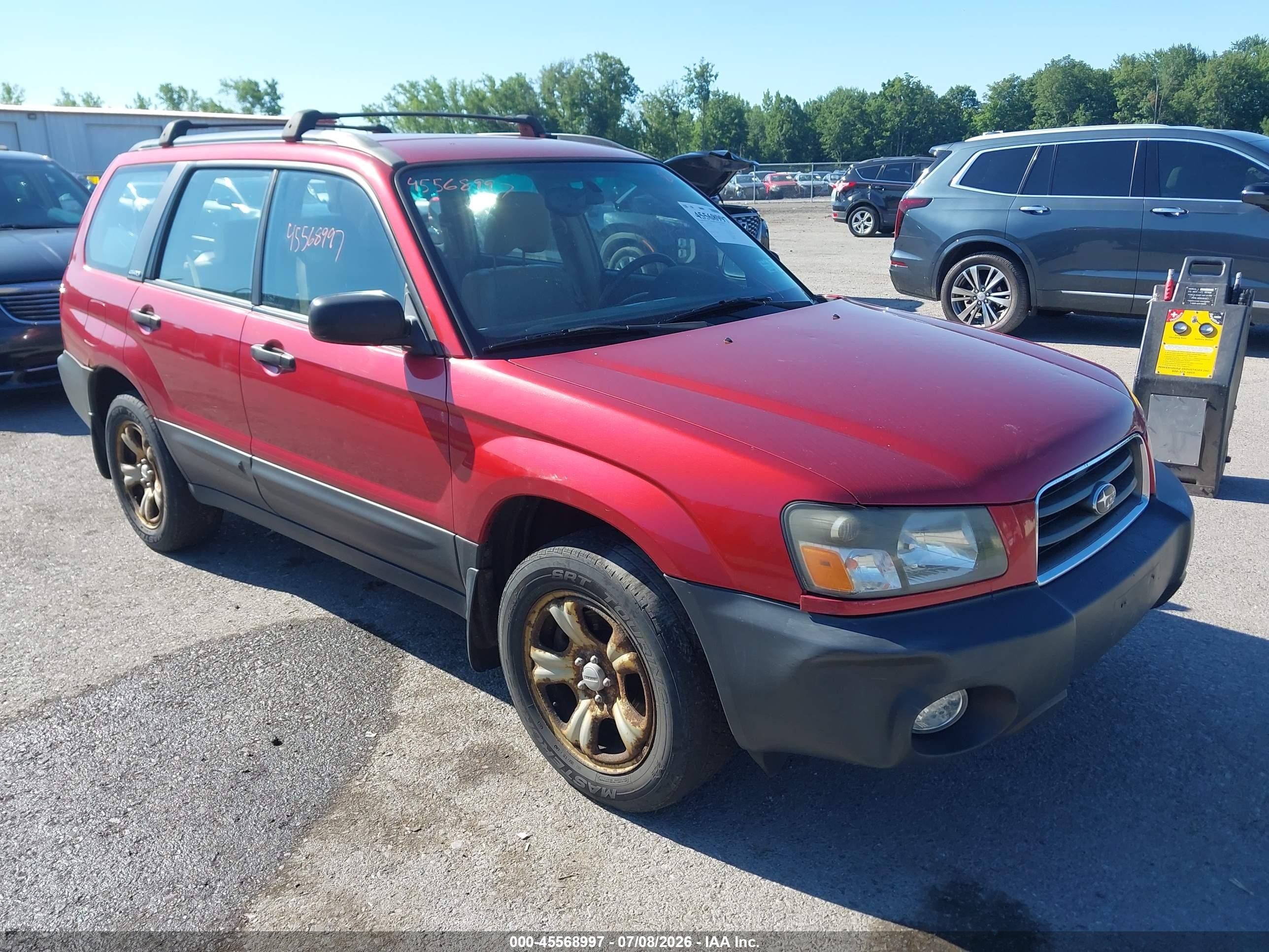 2004 Subaru Forester X, VIN JF1SG636X4H752566 — Side