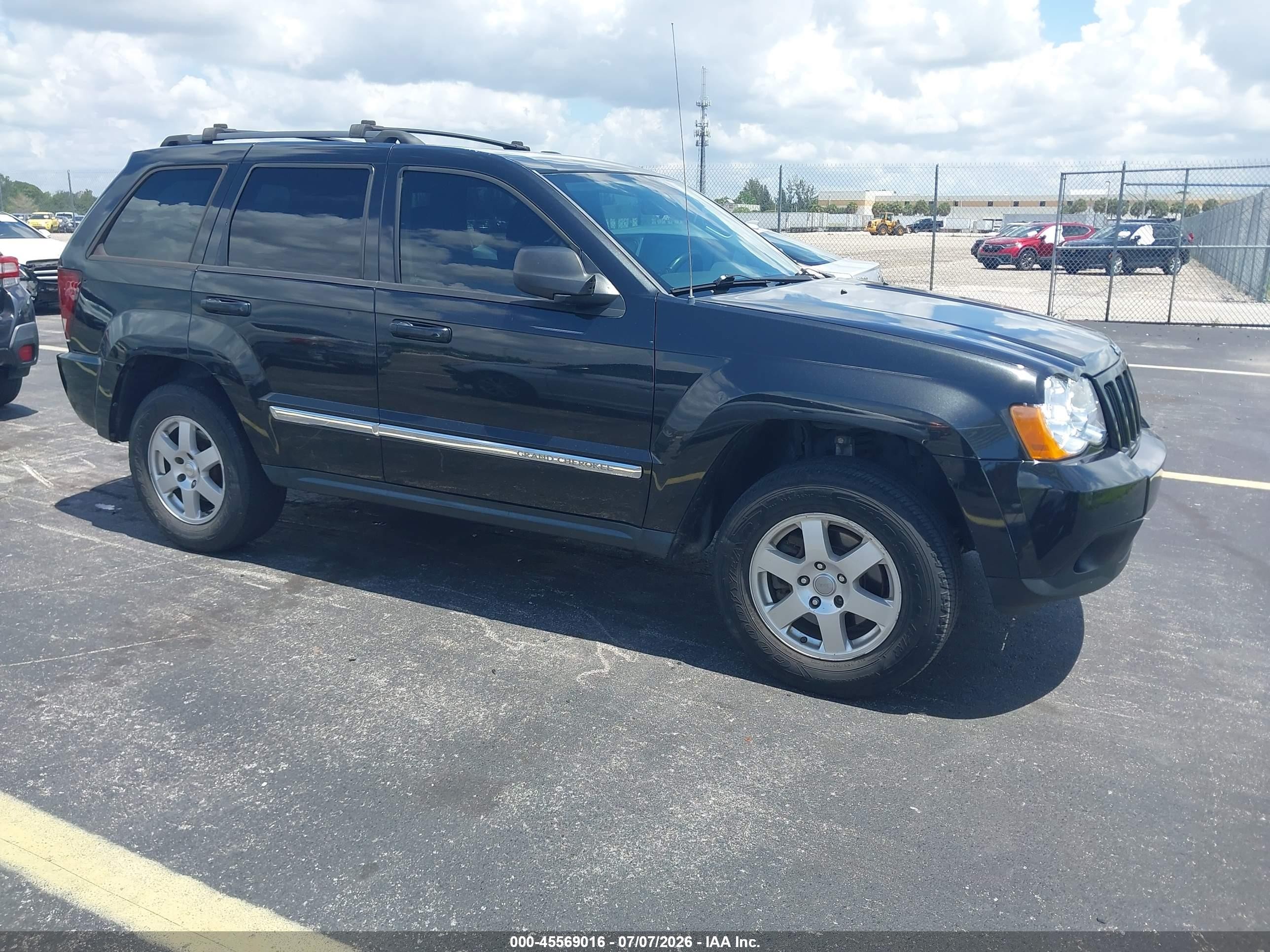 2010 Jeep Grand Cherokee Laredo, VIN 1J4PS4GKXAC124309 — Rear end