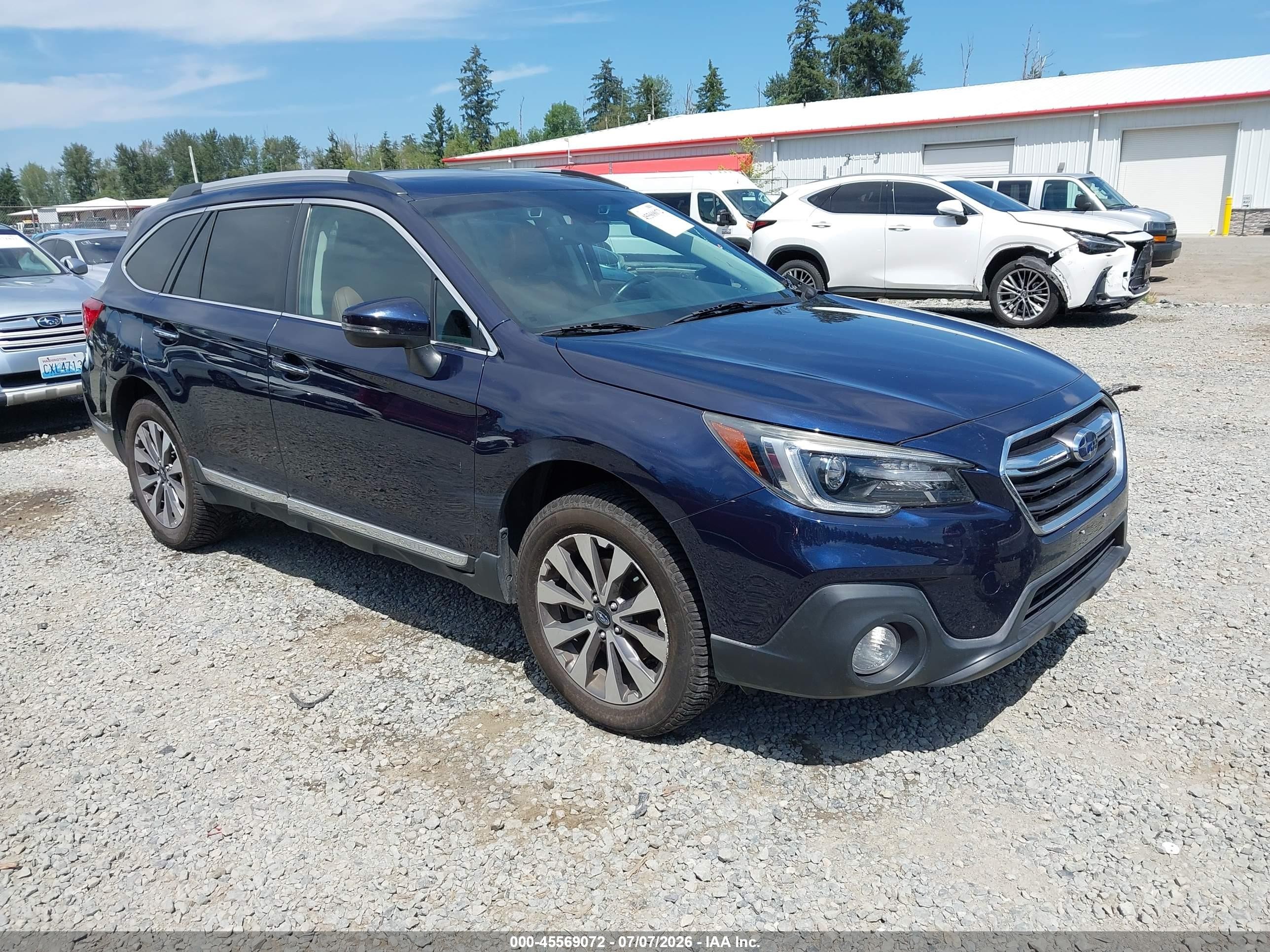 2018 Subaru Outback Touring, VIN 4S4BSATC4J3212281 — Side