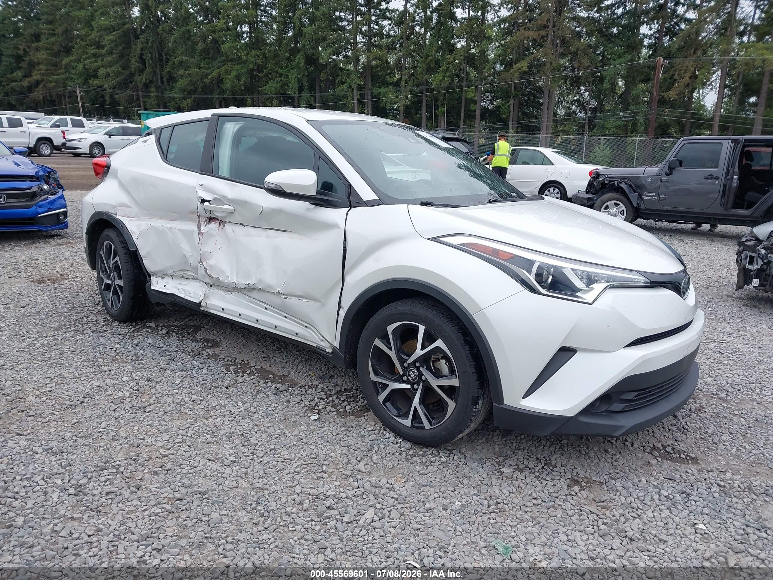 2018 Toyota C-HR XLE Premium, VIN NMTKHMBX1JR037476 — Side