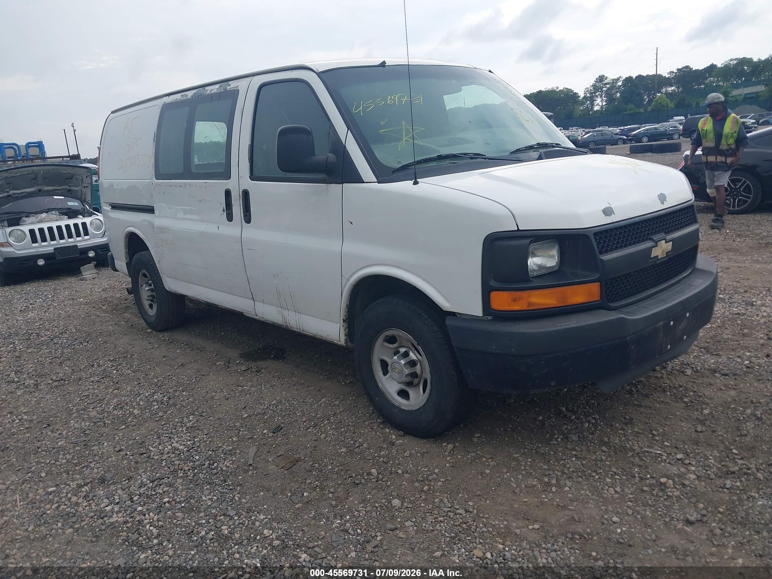 2011 Chevrolet Express Cargo, VIN 1GCWGFCA0B1127244 — Side
