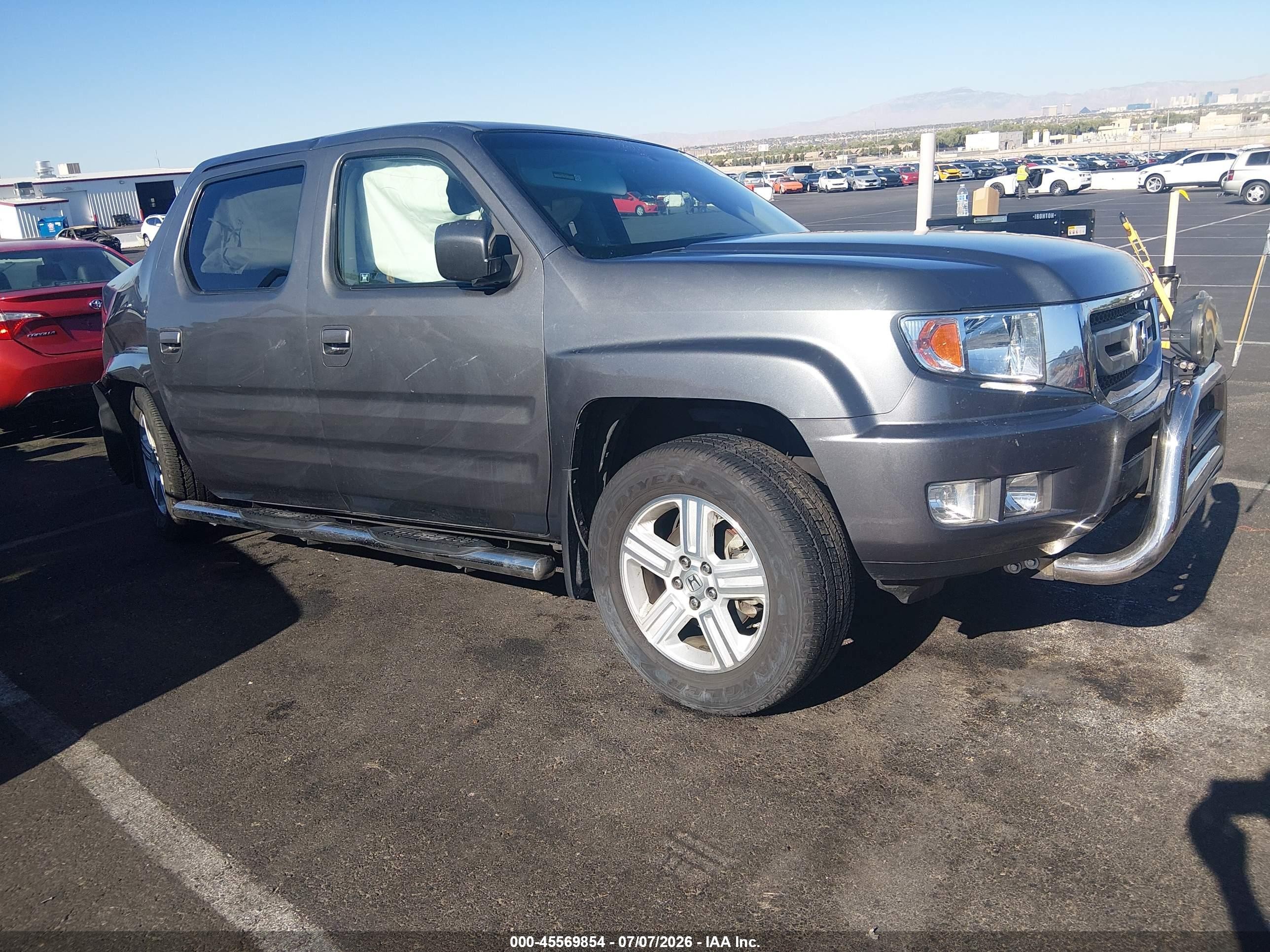 2011 Honda Ridgeline RTL, VIN 5FPYK1F59BB002511 — Rear end